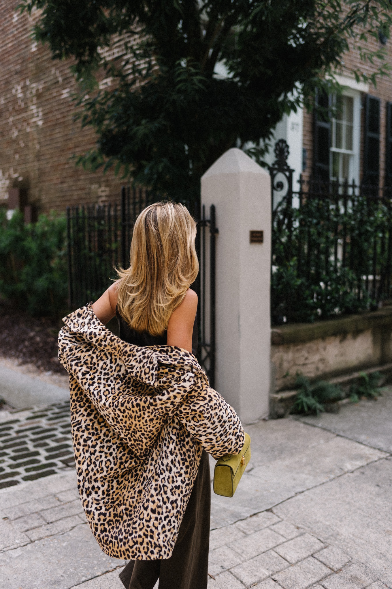 Leather halter top, brown denim, leopard print coat