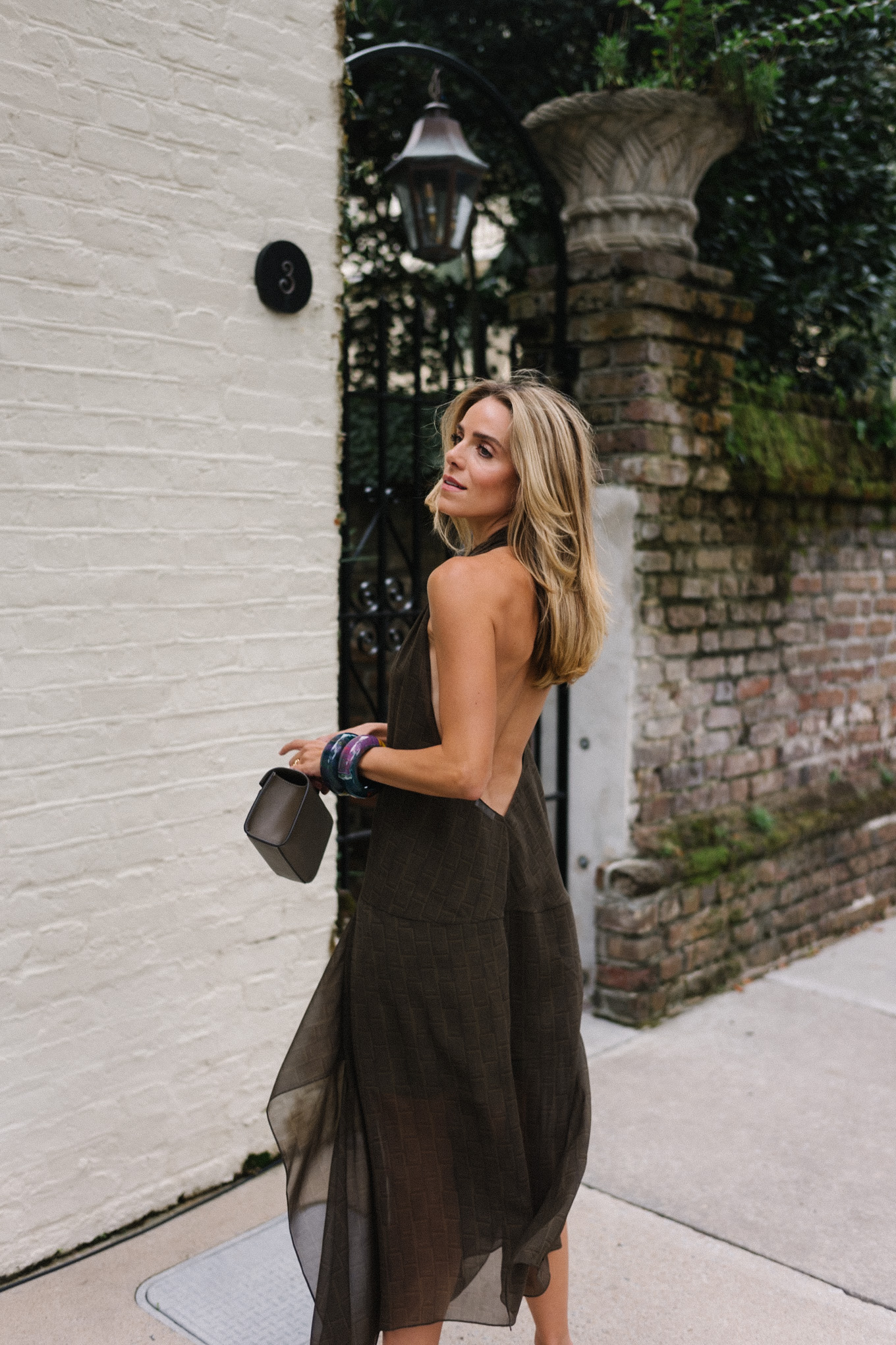 brown handkercheif dress brown leather handbag silver pumps