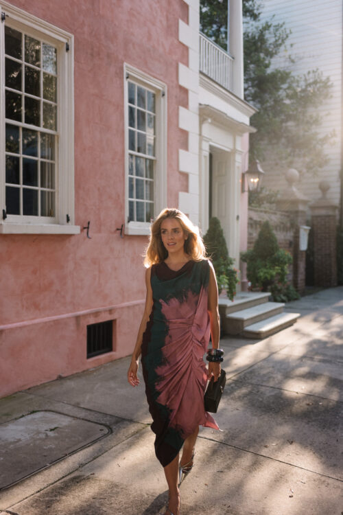 pink teal silk stretch midi dress silver heels leather bag