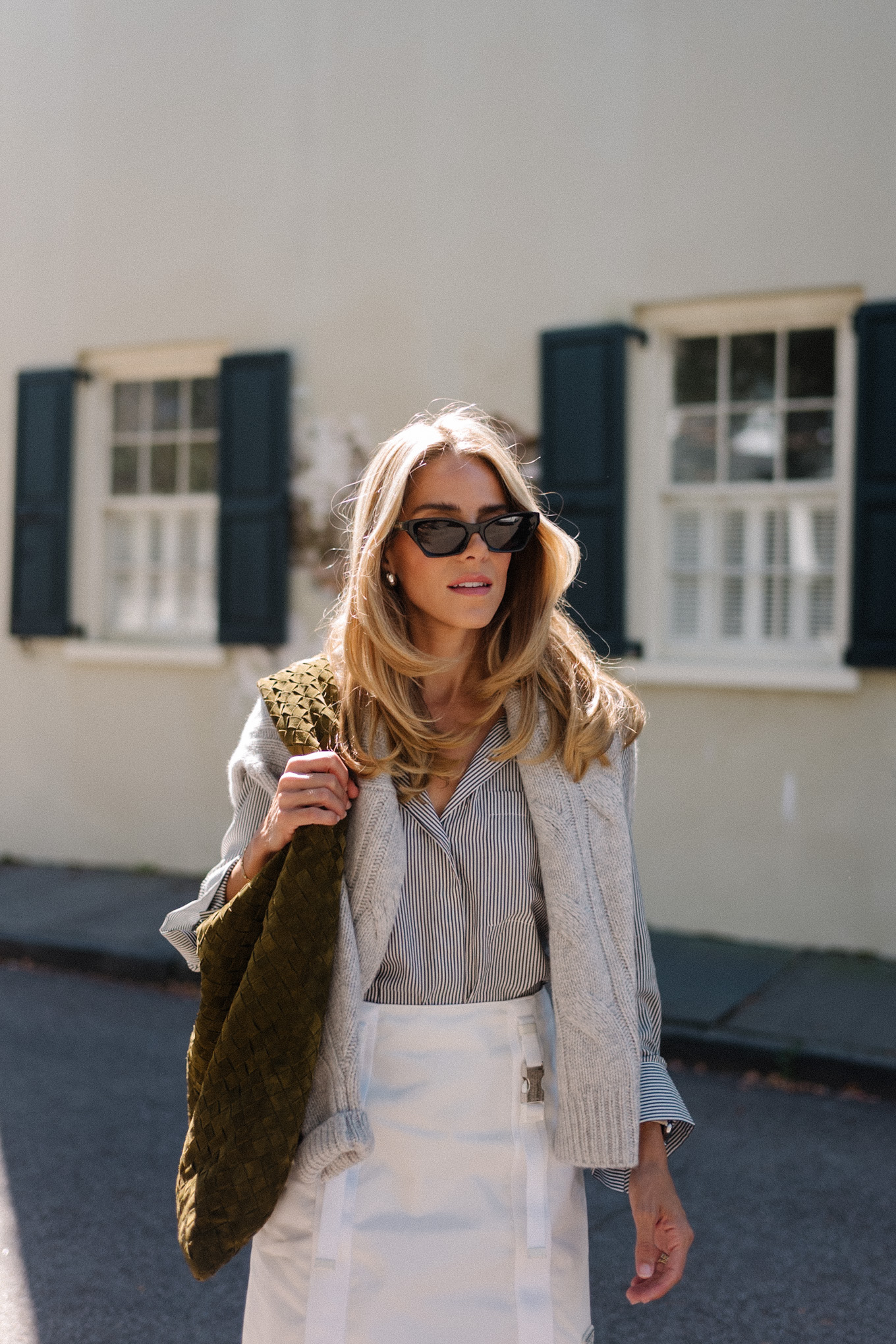 grey sweater striped button down white mini skirt suede hobo bag