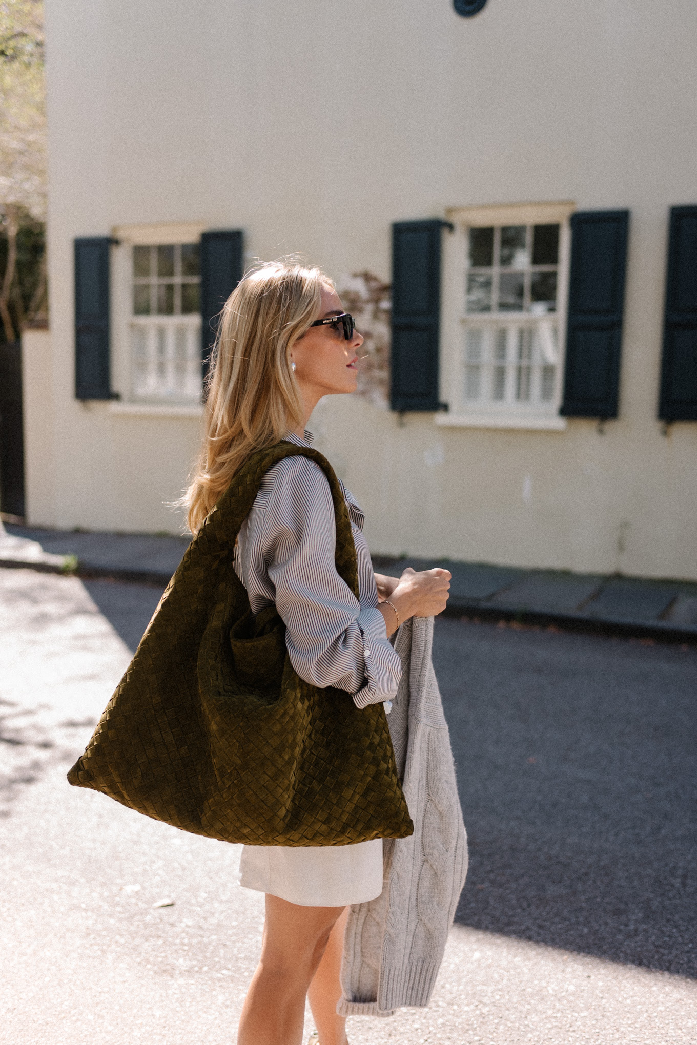 grey sweater striped button down white mini skirt suede hobo bag