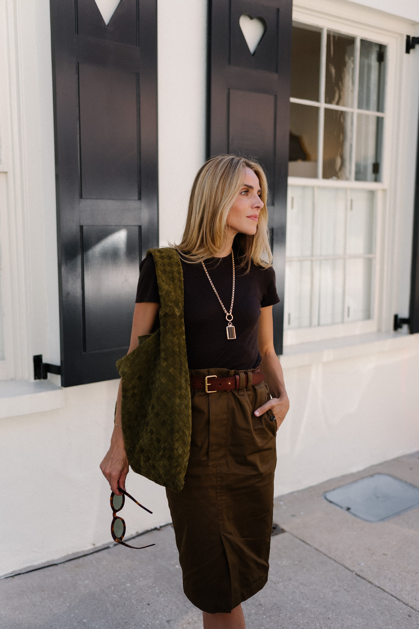 Black T-shirt Brown belted midi skirt Suede hobo bag