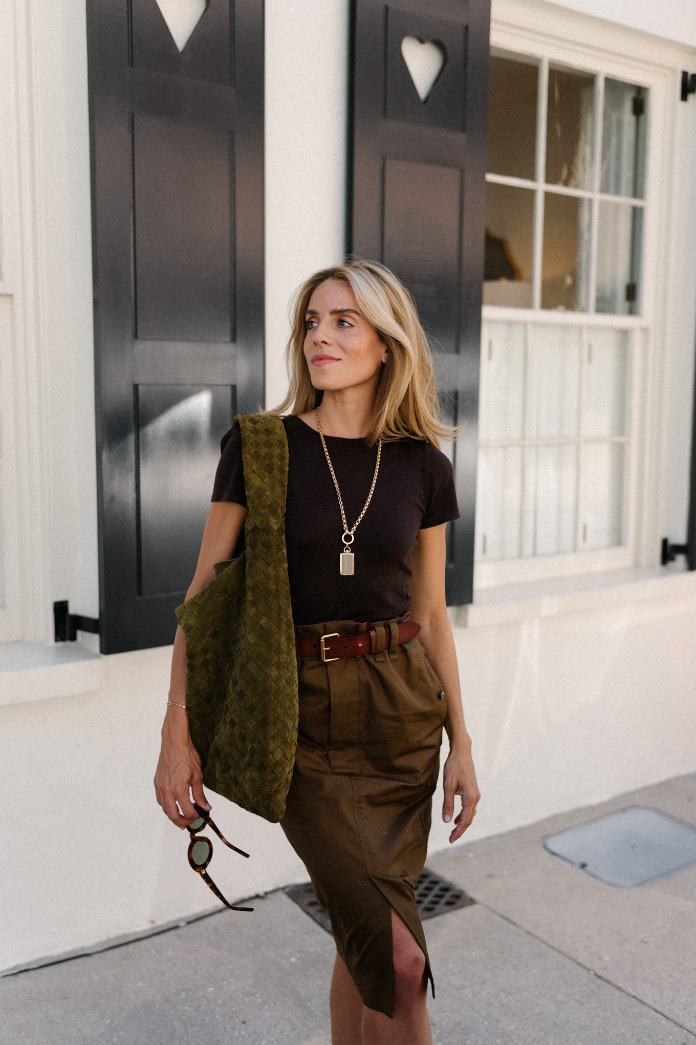 Black T-shirt Brown belted midi skirt Suede hobo bag