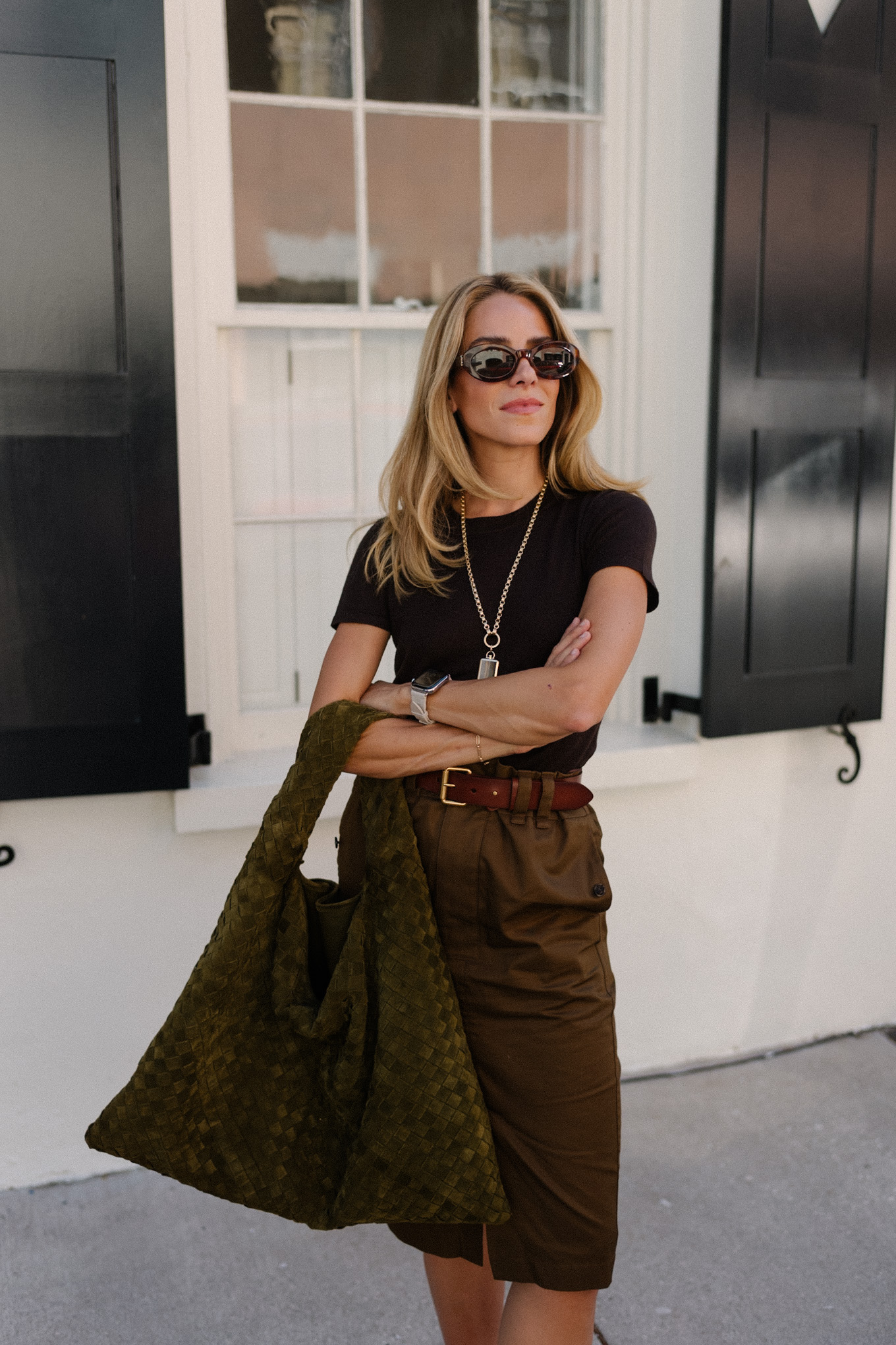 Black T-shirt Brown belted midi skirt Suede hobo bag