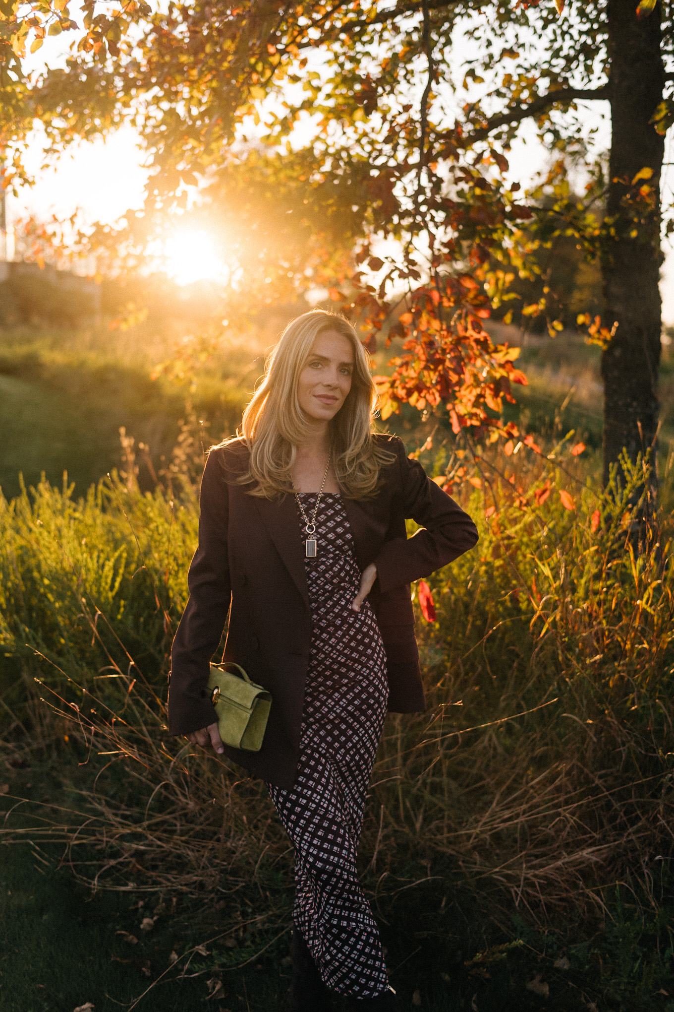 Brown mesh plaid skirt suit, brown suit jacket, brown boots, green suede bag