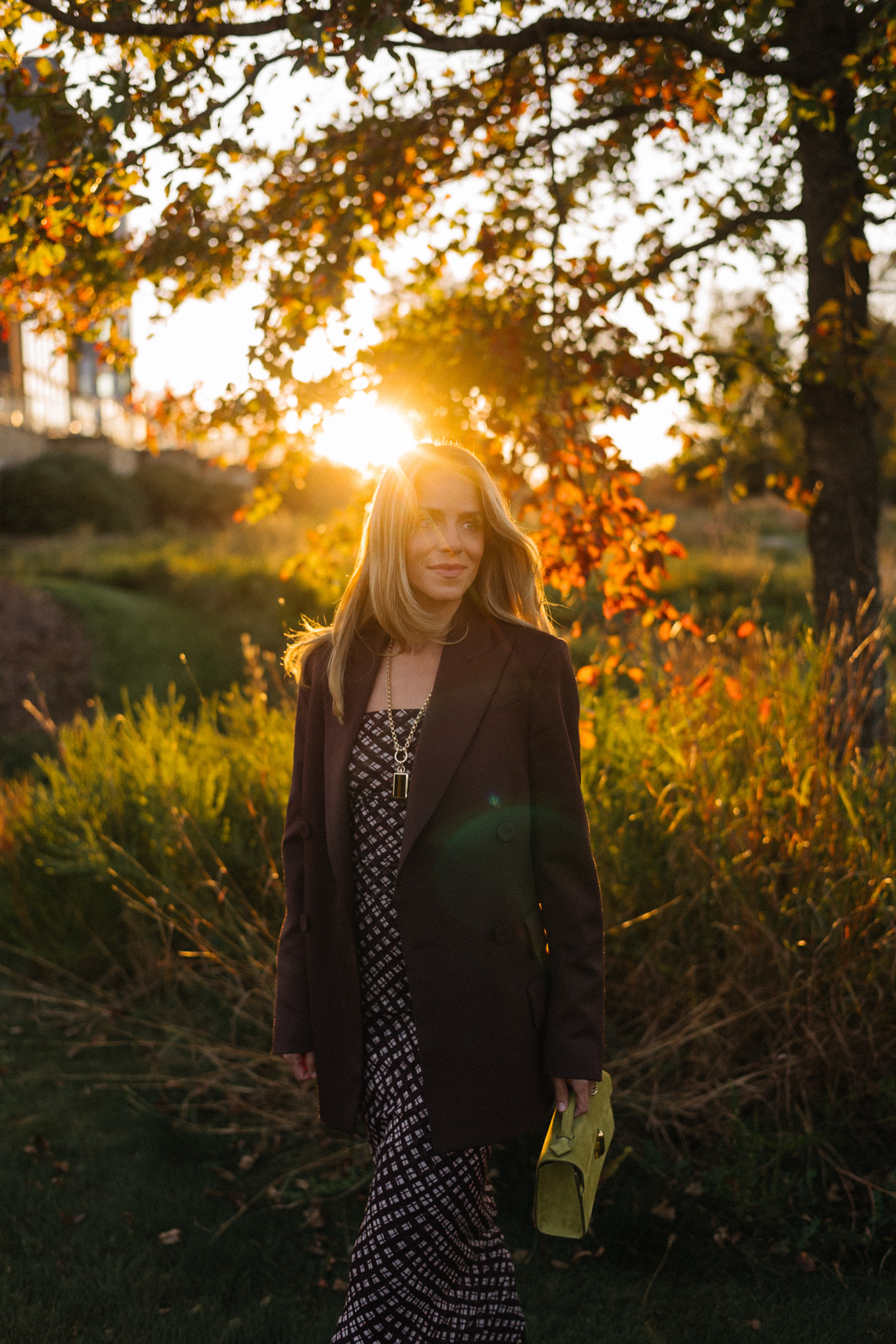 Brown mesh plaid skirt suit, brown suit jacket, brown boots, green suede bag