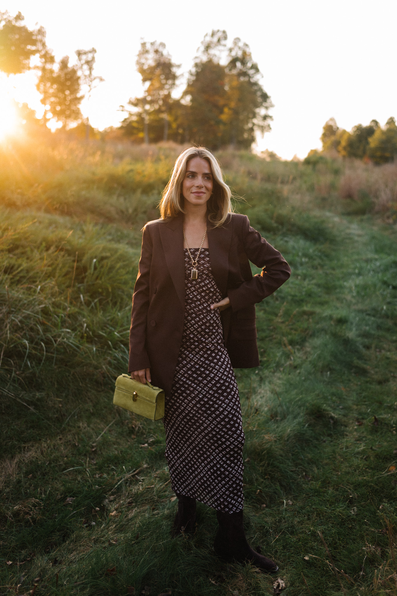 Brown mesh plaid skirt suit, brown suit jacket, brown boots, green suede bag