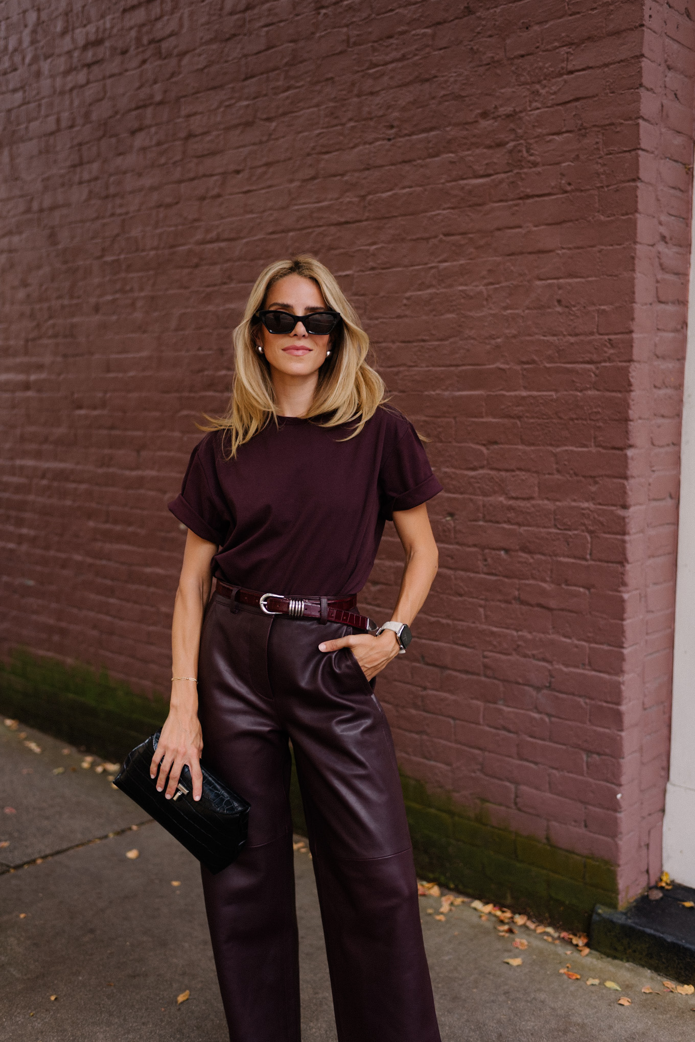 Chestnut T-shirt, chestnut leather pants, snakeskin flats