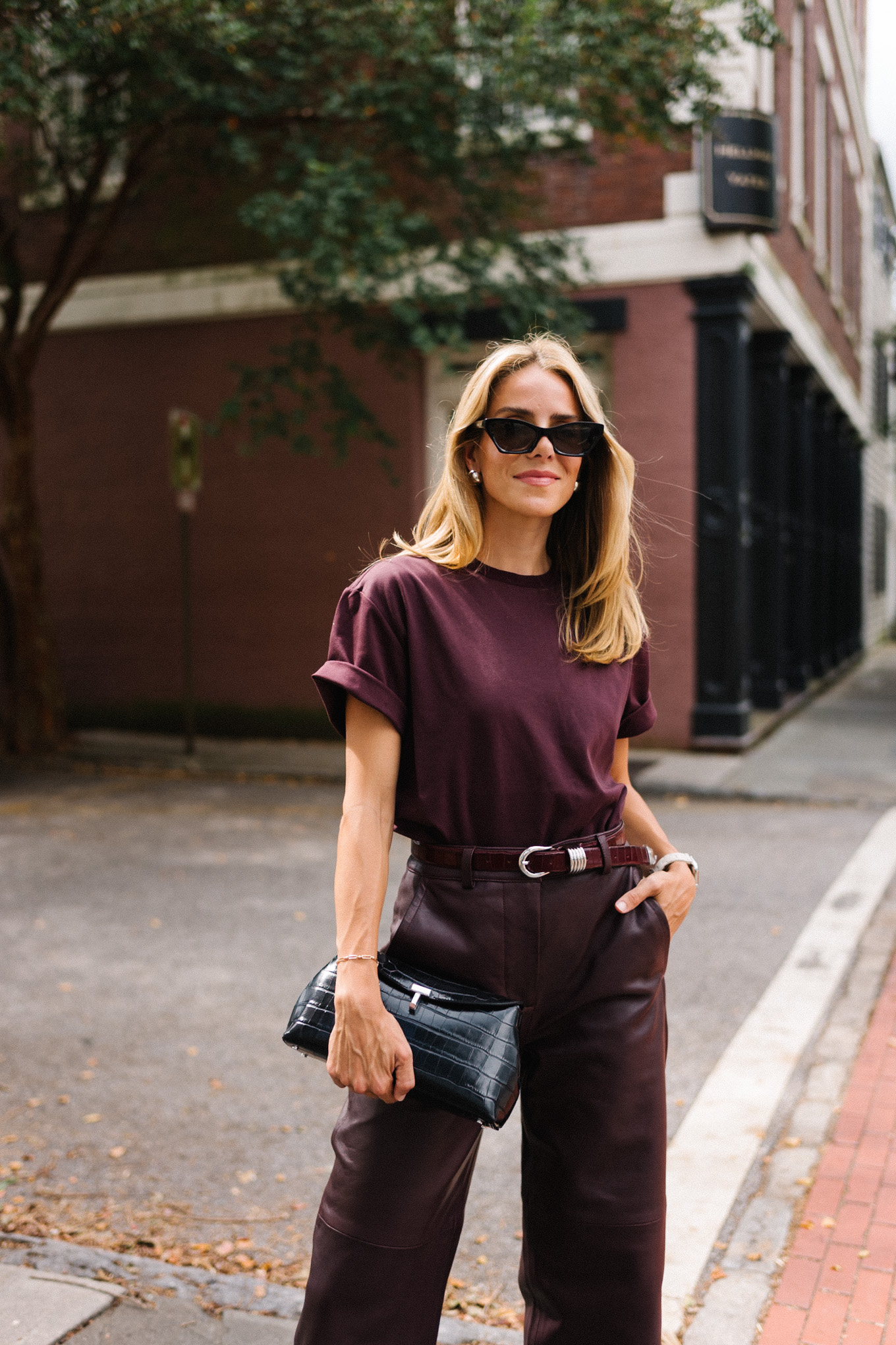 Chestnut T-shirt, chestnut leather pants, snakeskin flats