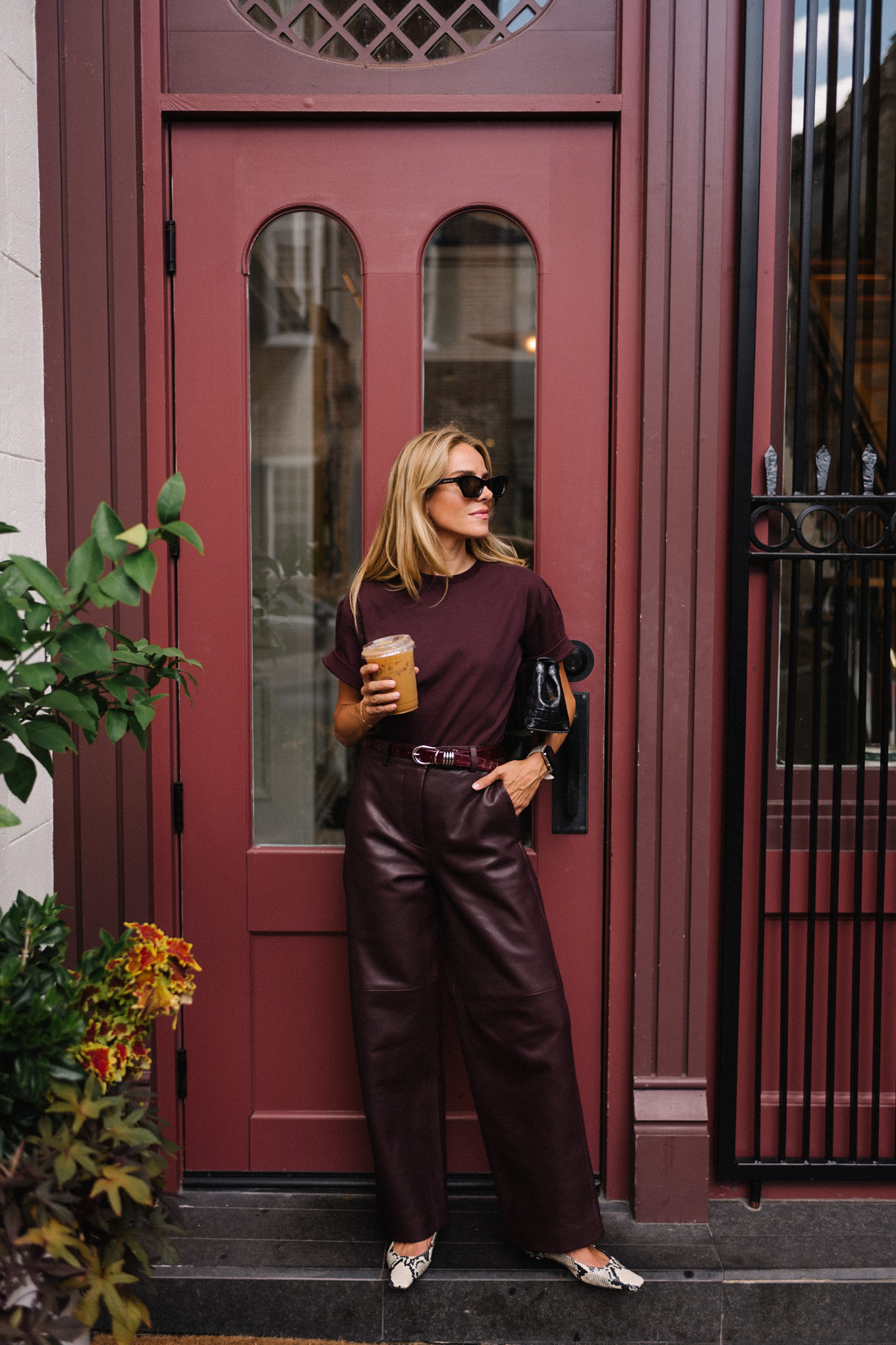 Chestnut T-shirt, chestnut leather pants, snakeskin flats