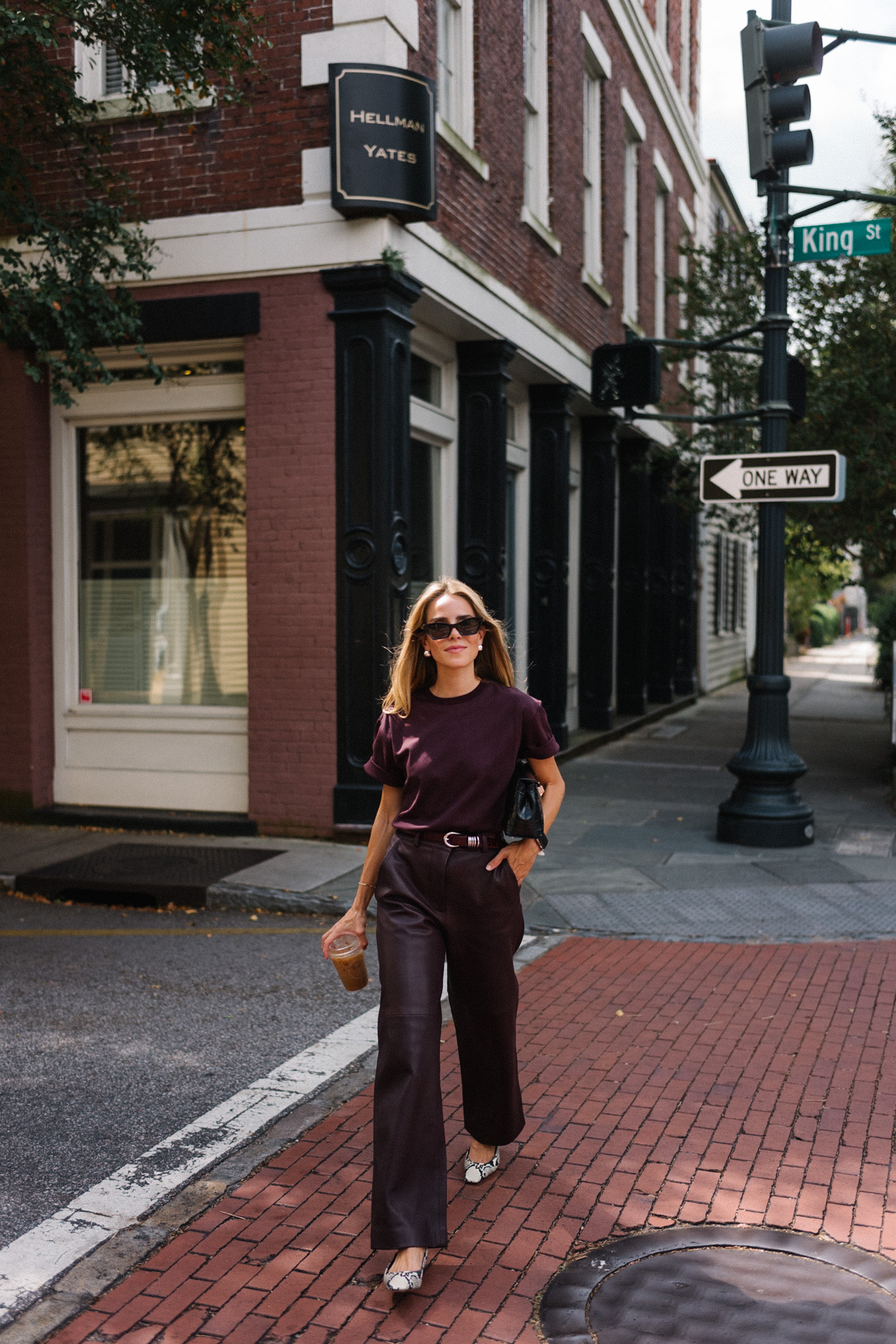 Chestnut T-shirt, chestnut leather pants, snakeskin flats