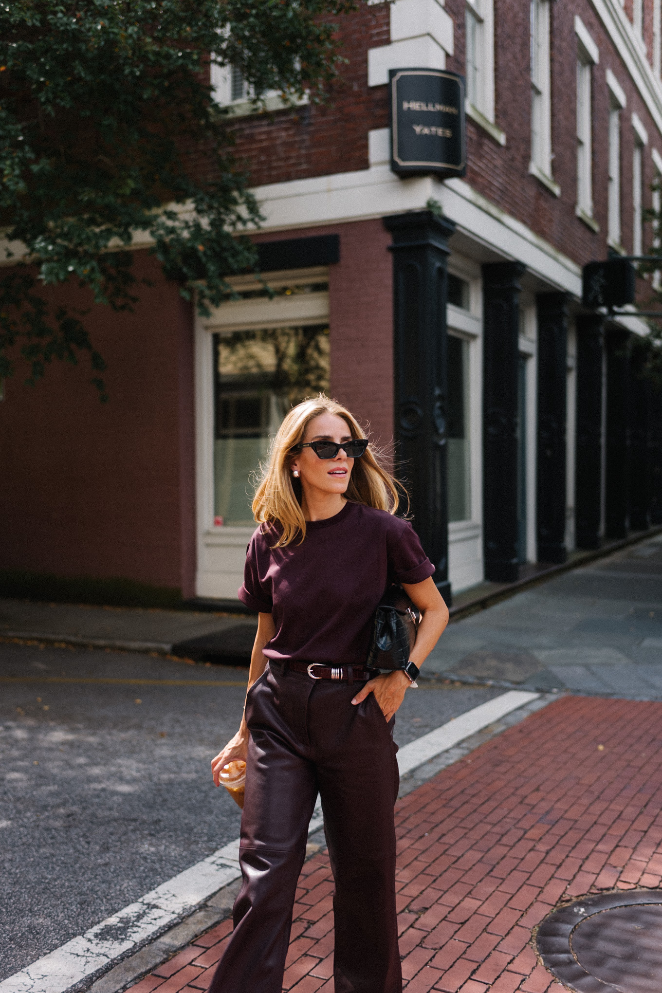 Chestnut T-shirt, chestnut leather pants, snakeskin flats