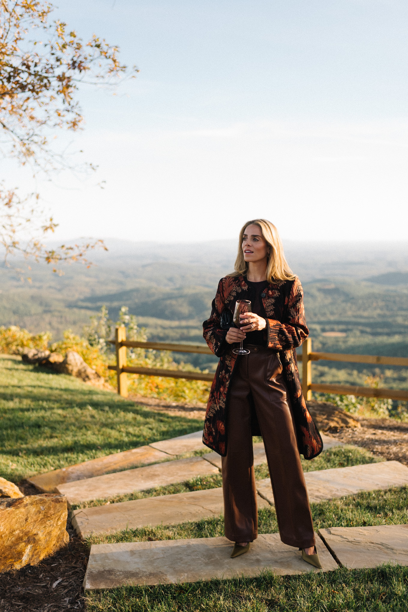 floral pleated car coat brown leather pants