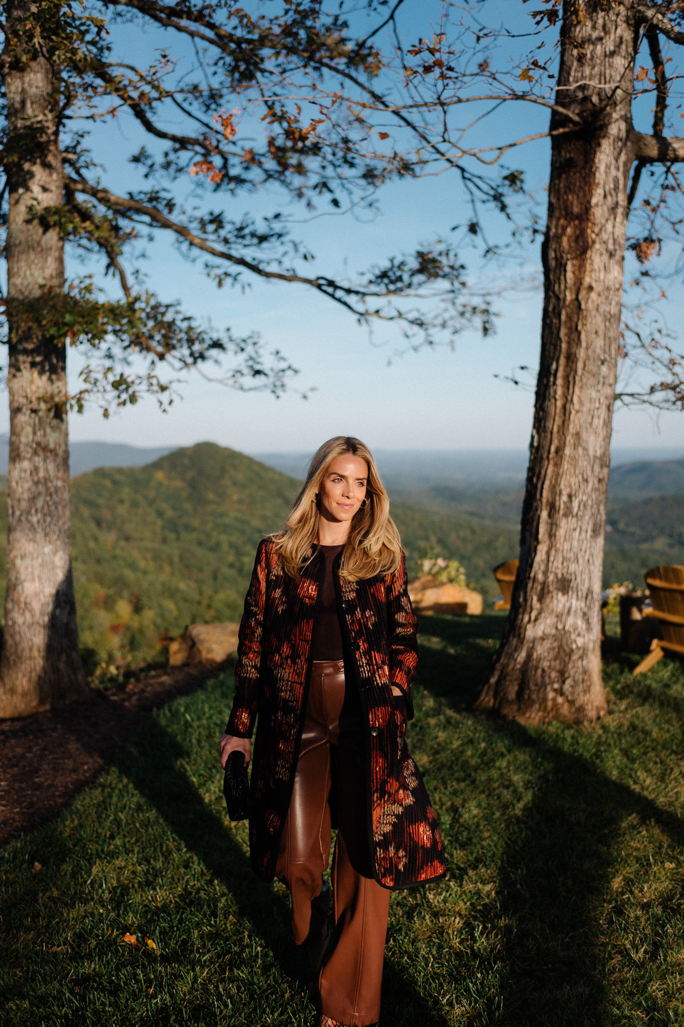 floral pleated car coat brown leather pants