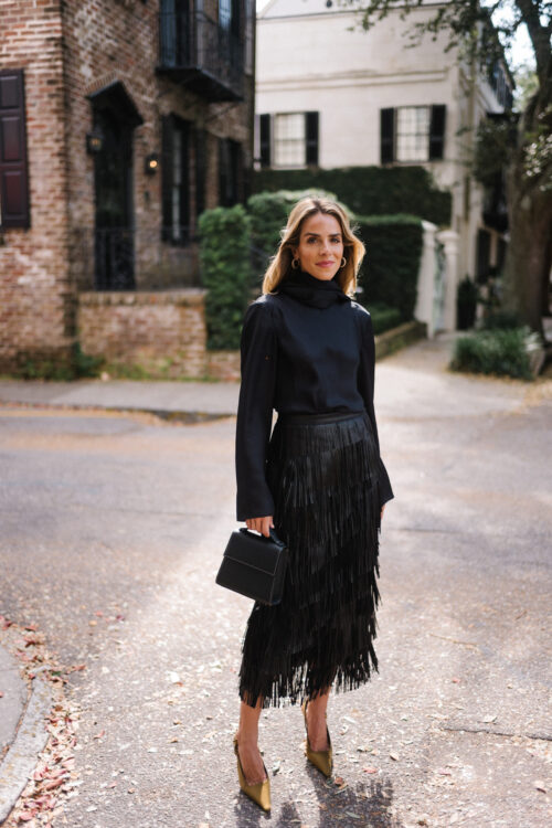 black silk wrap blouse black leather fringe skirt chartreuse pumps black leather handbag