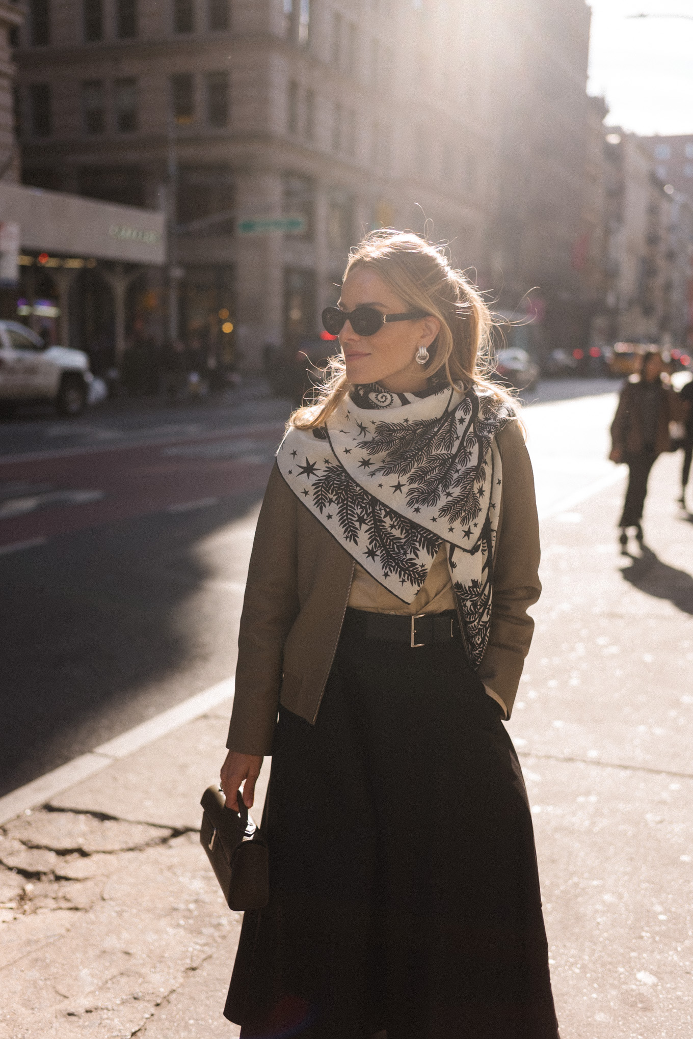 deerskin cropped jacket tan oxford shirt black skirt silk scarf black boots