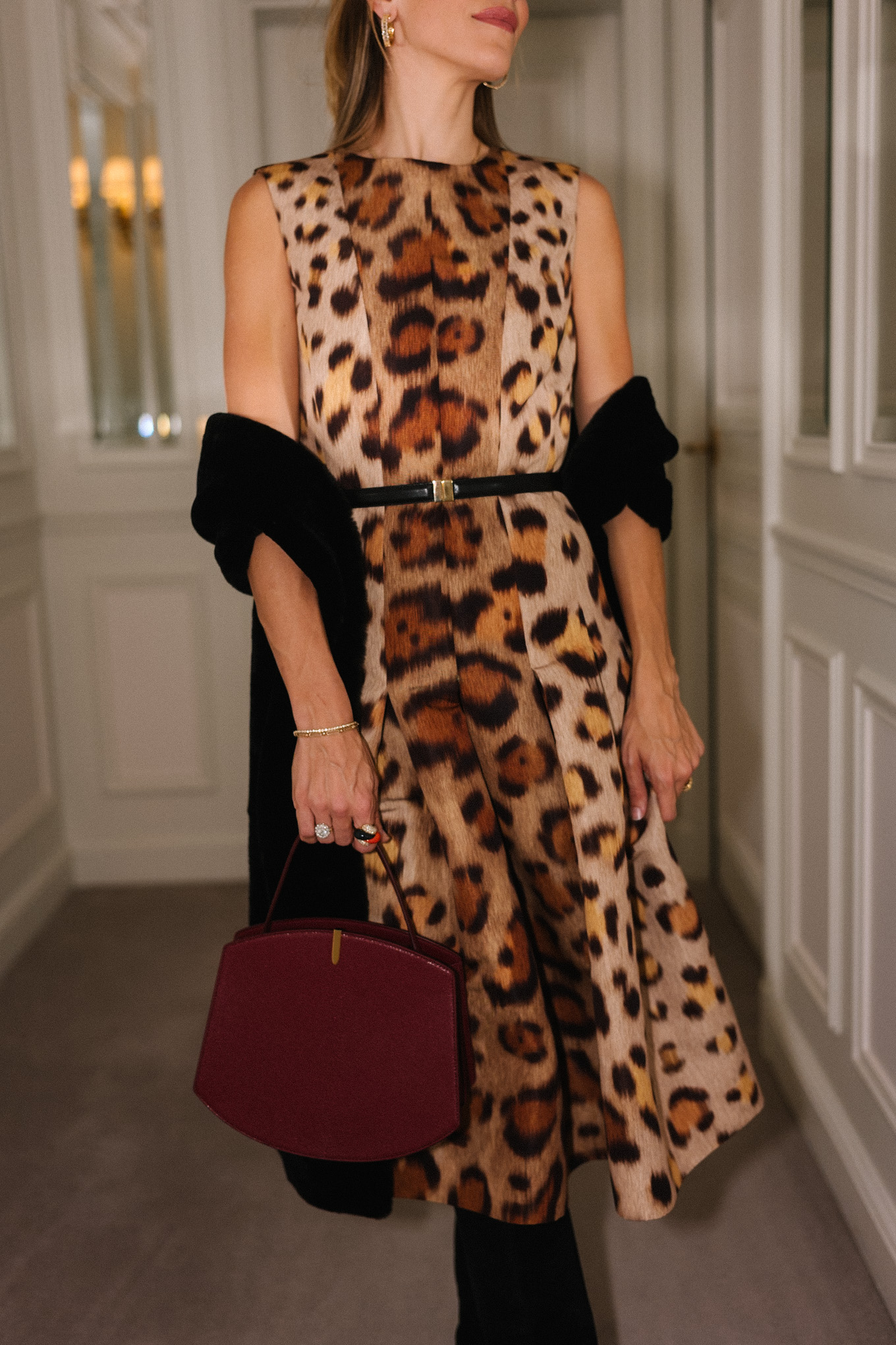 leopard dress black boots maroon bag