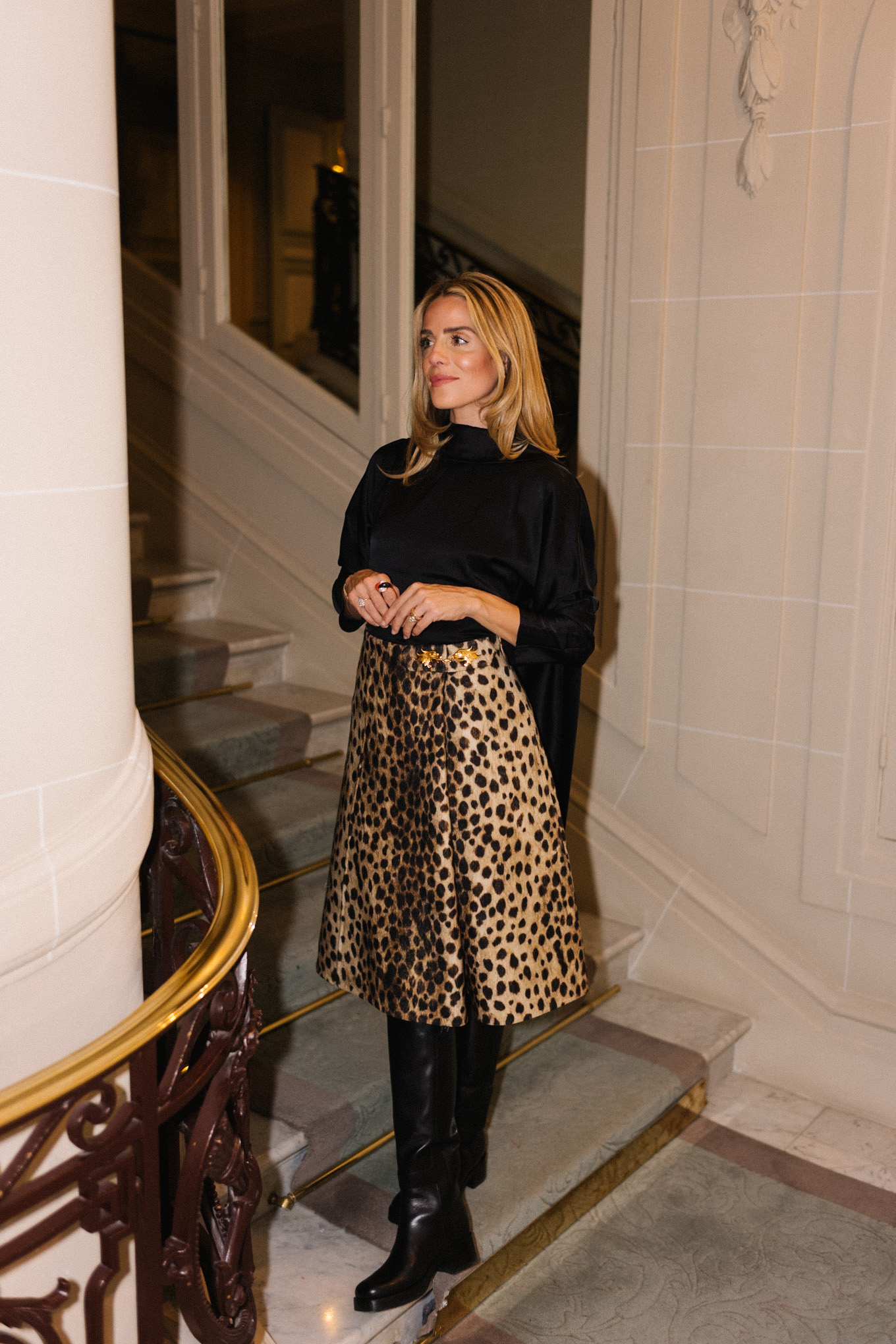 leopard skirt black silk draped blouse black leather boots