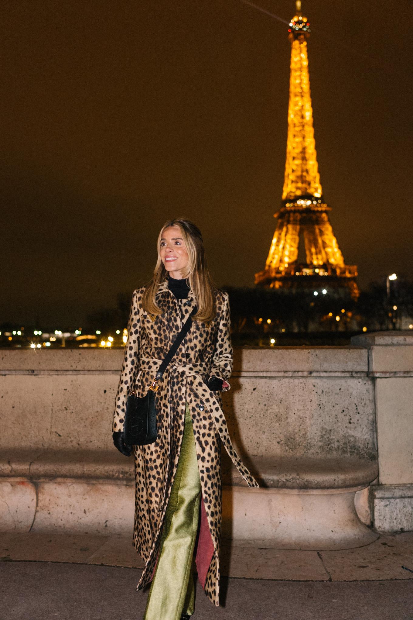 leopard winter coat green satin pants black pumps black leather bag