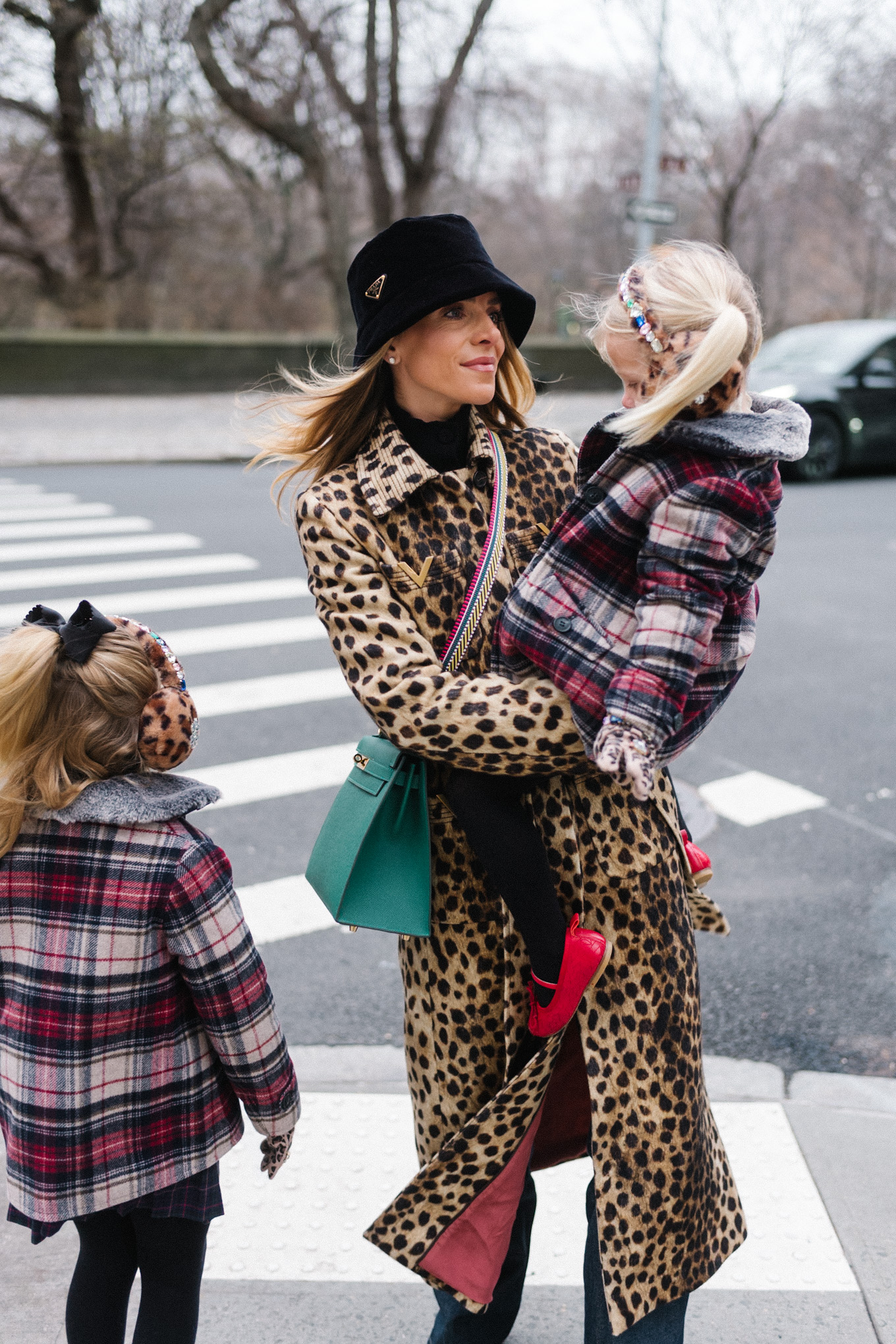 cheetah print wool coat black velvet bucket hat nyc at christmas