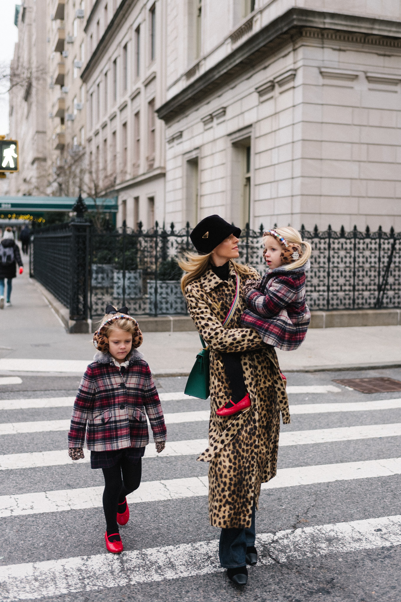 cheetah print wool coat black velvet bucket hat nyc at christmas