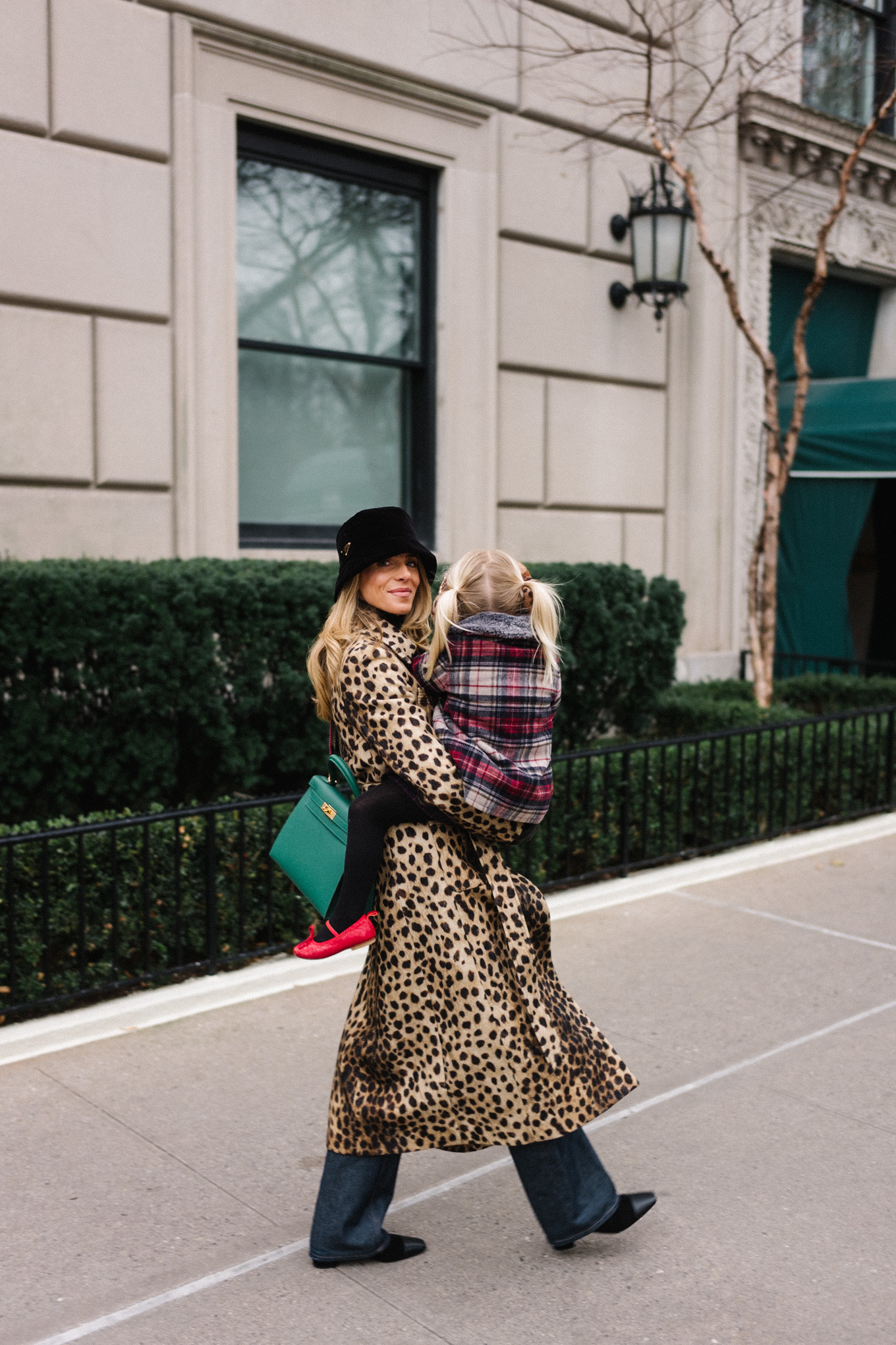 cheetah print wool coat black velvet bucket hat nyc at christmas