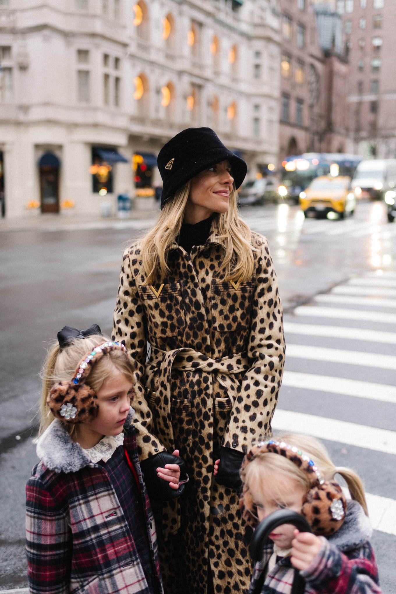 cheetah print wool coat black velvet bucket hat nyc at christmas