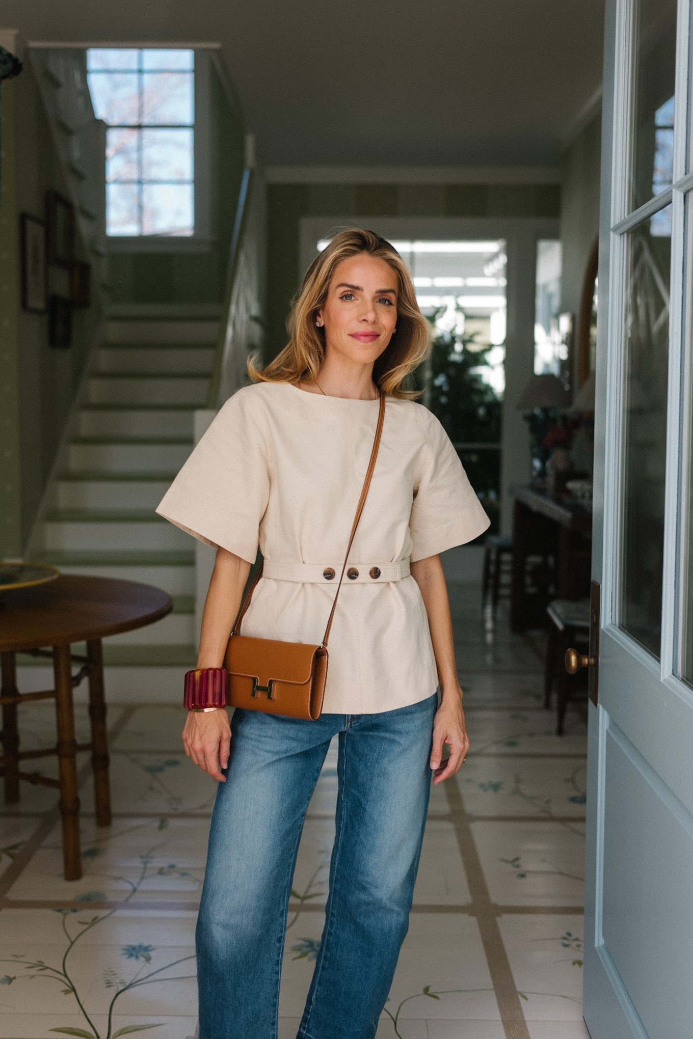 blue denim cream blouse brown handbag