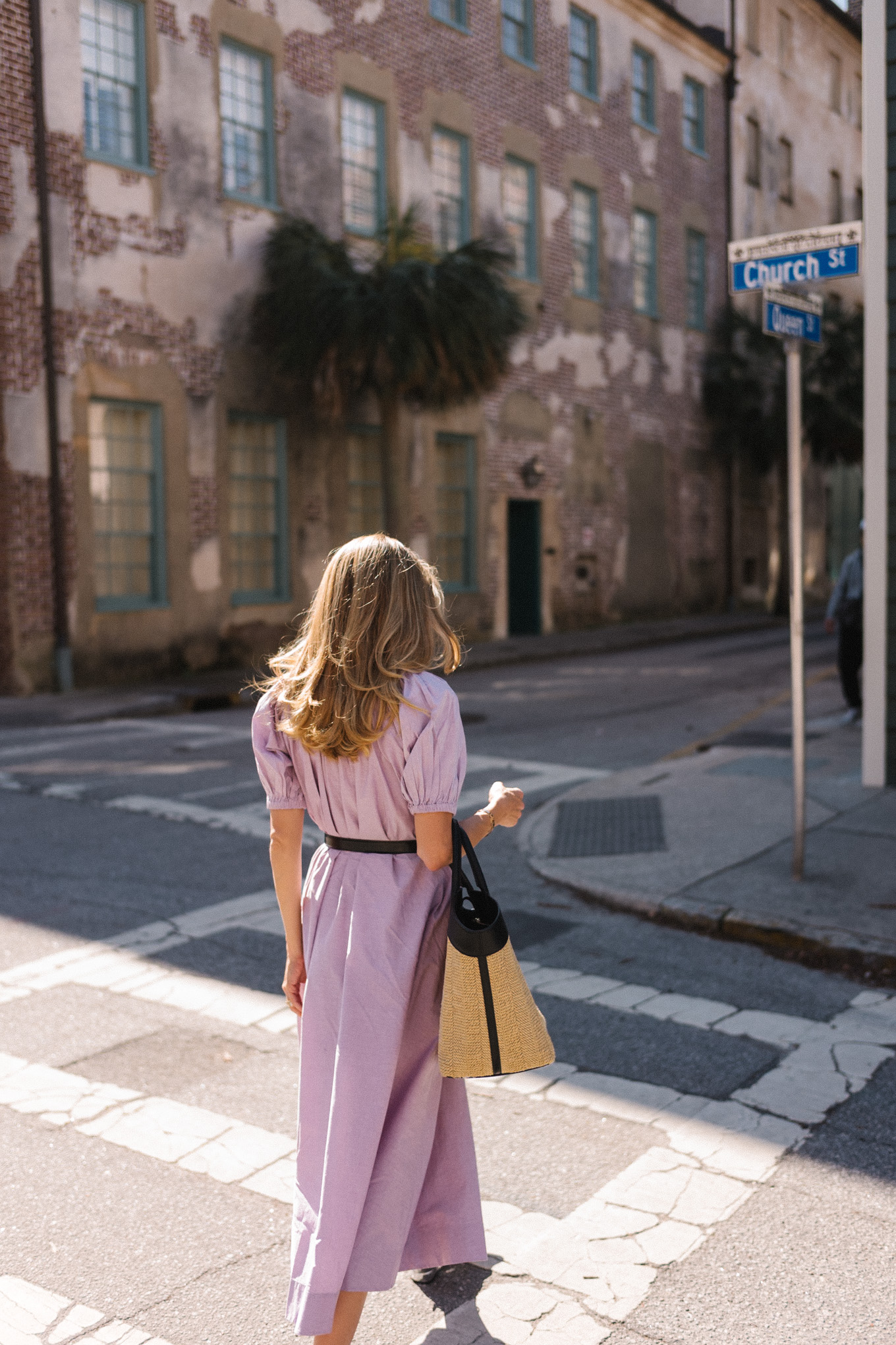 lavender midi dress rattan tote silver pumps