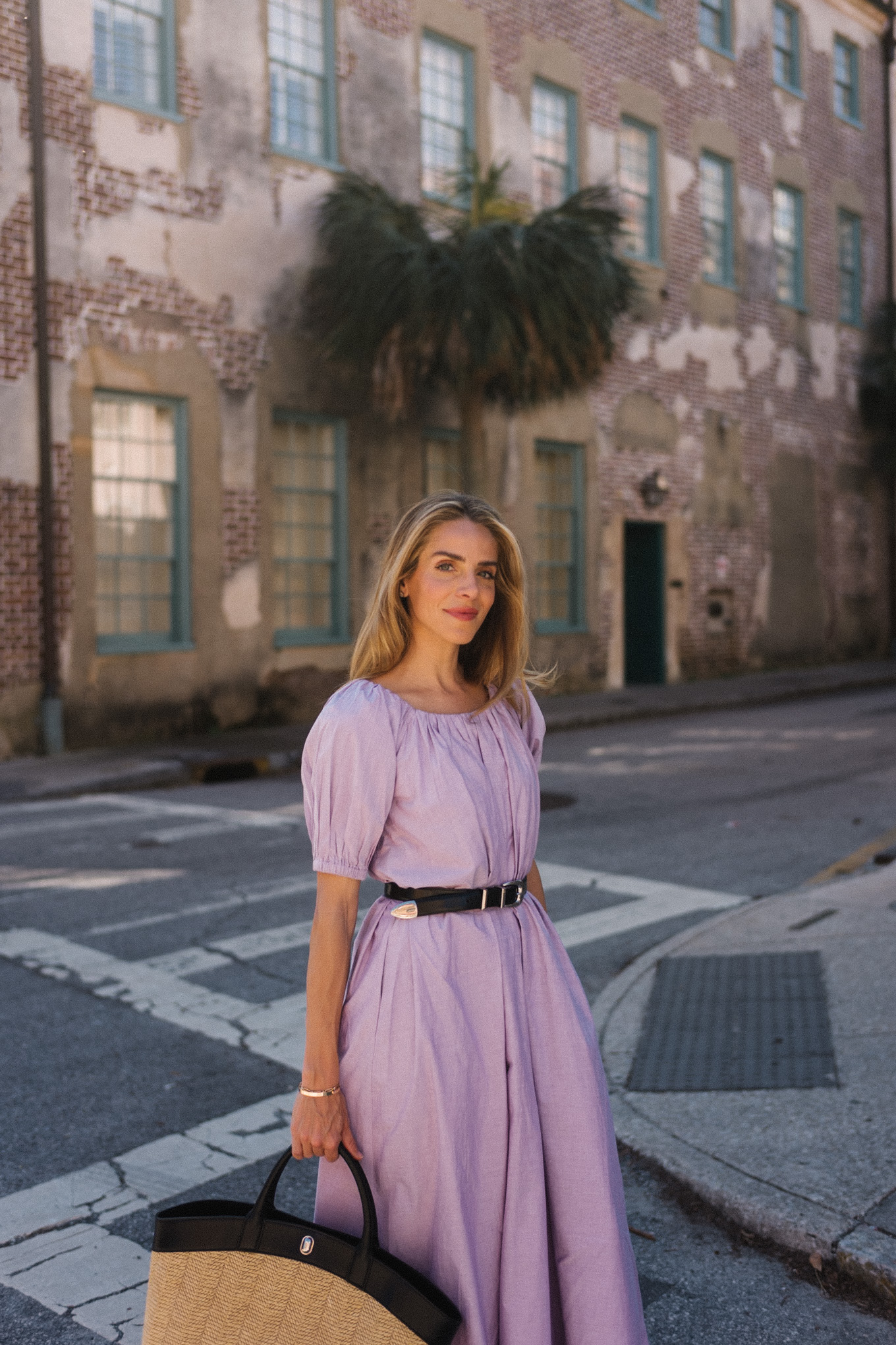 lavender midi dress rattan tote silver pumps