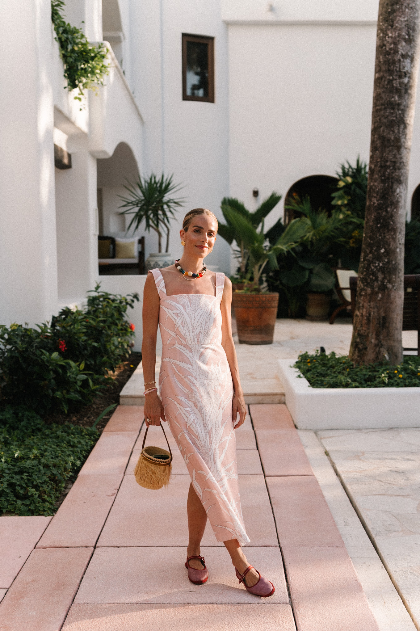 pastel pink cotton midi dress stone necklace pink raffia mary janes