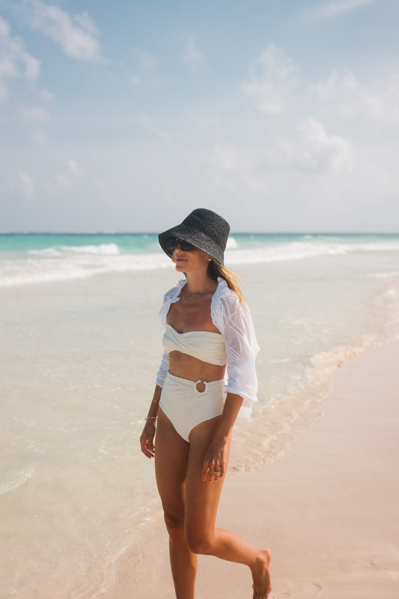 white swim black straw hat white button down white lace shorts