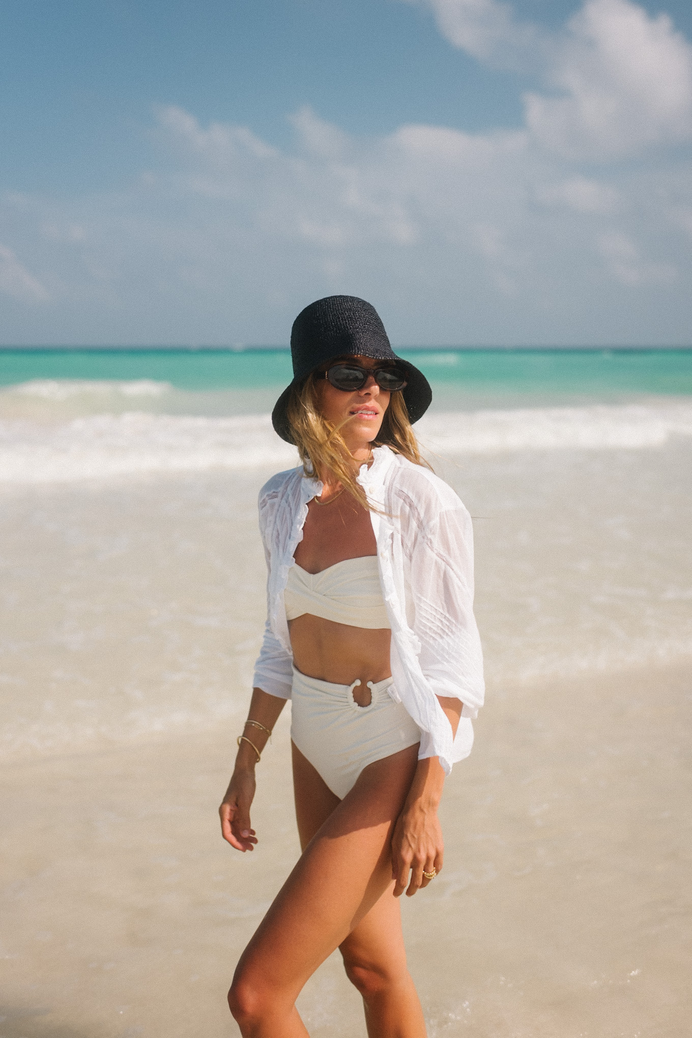 white swim black straw hat white button down white lace shorts