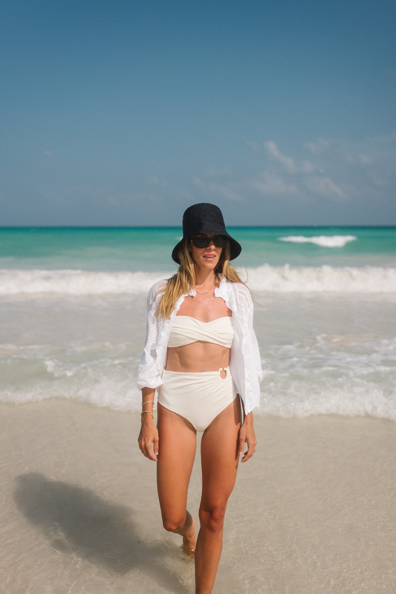 white swim black straw hat white button down white lace shorts