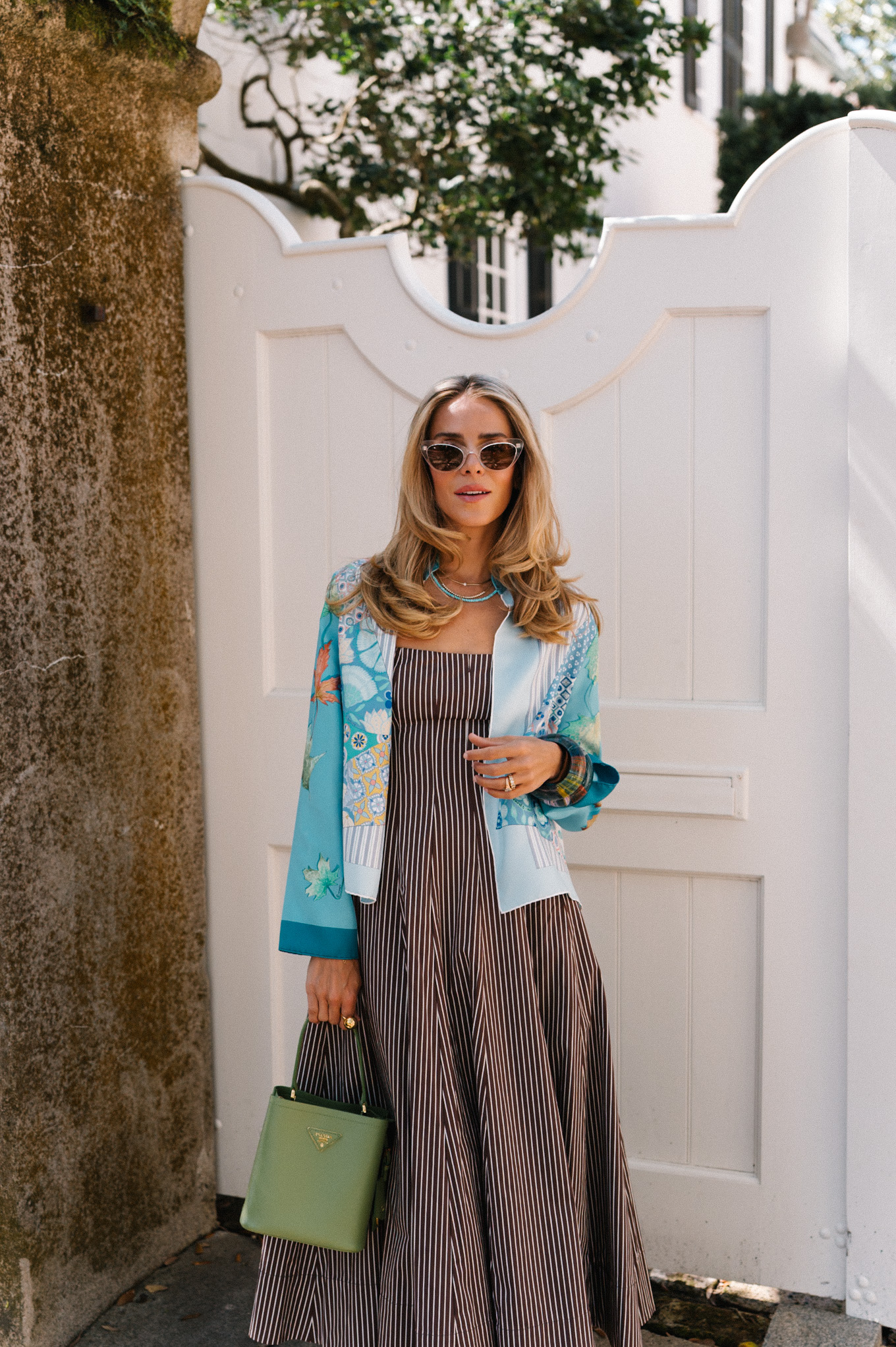 Brown striped midi dress blue silk jacket green handbag woven flat