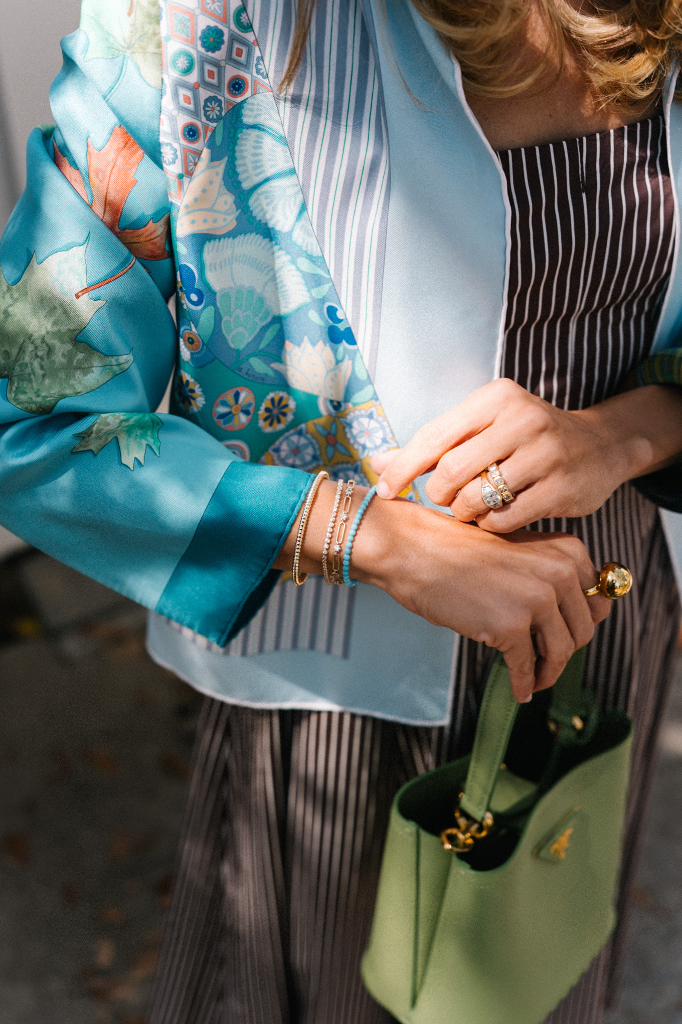 brown striped midi dress blue silk jacket green handbag woven flats