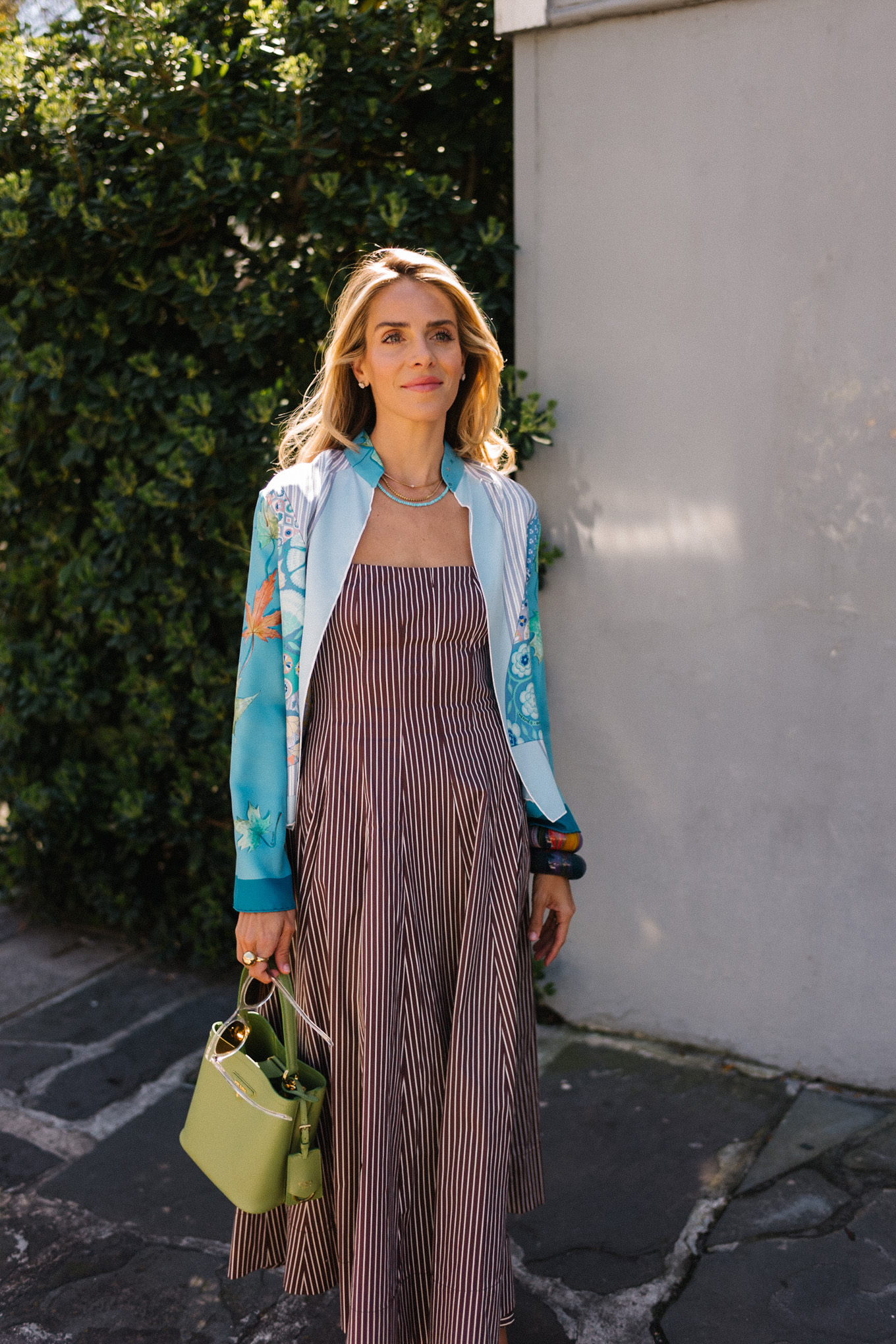 Brown striped midi dress blue silk jacket green handbag woven flat