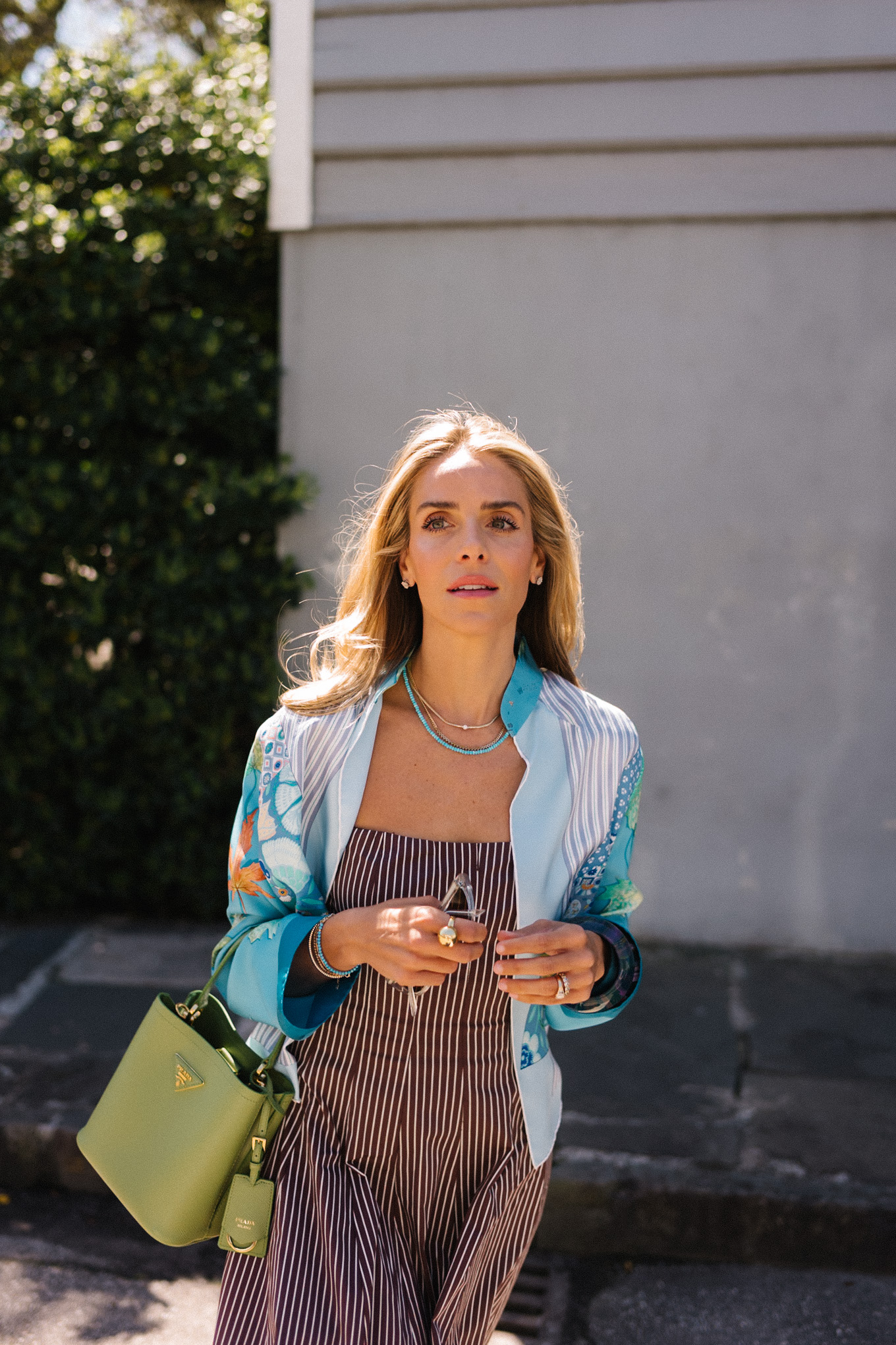 Brown striped midi dress blue silk jacket green handbag woven flat