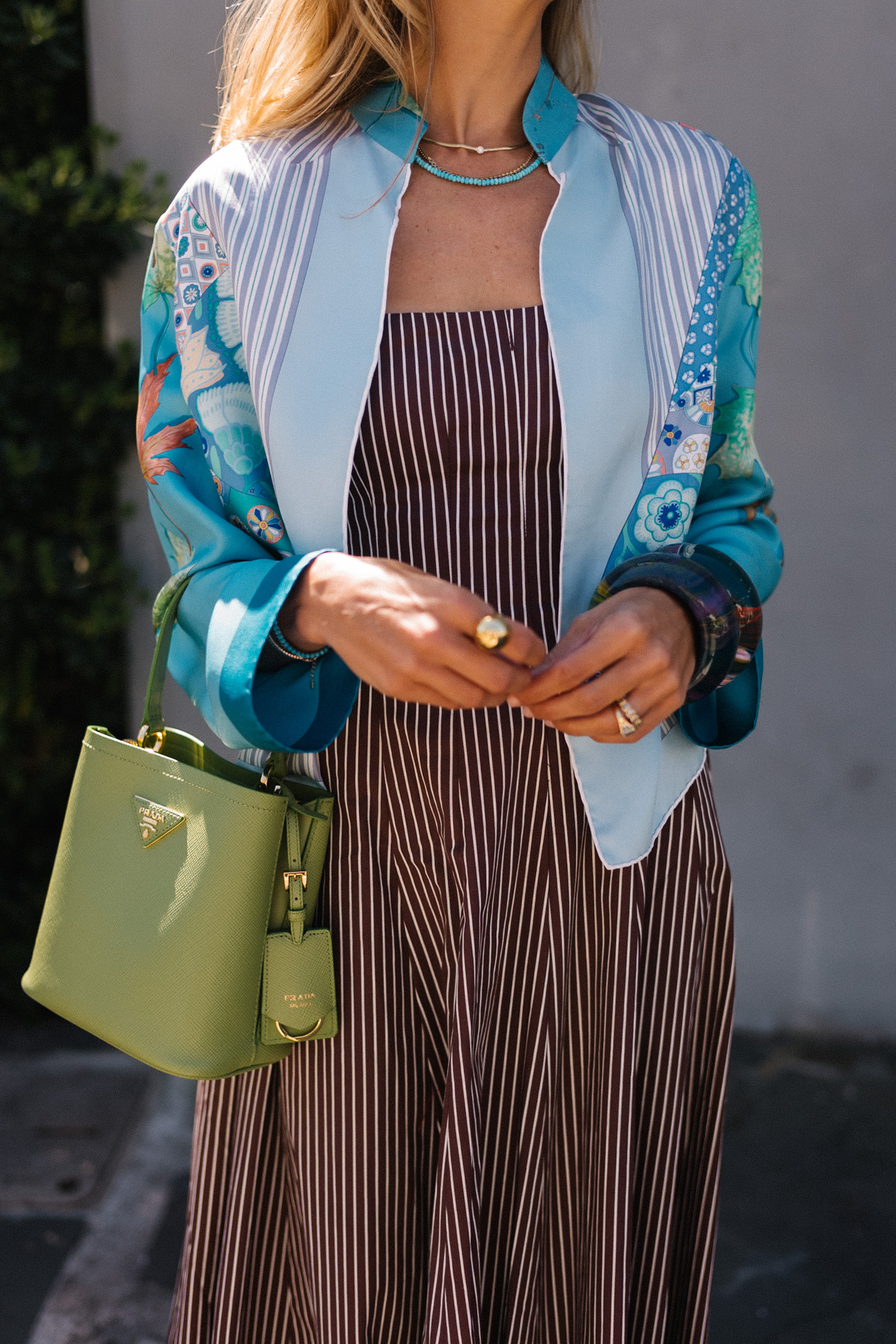 Brown striped midi dress blue silk jacket green handbag woven flat