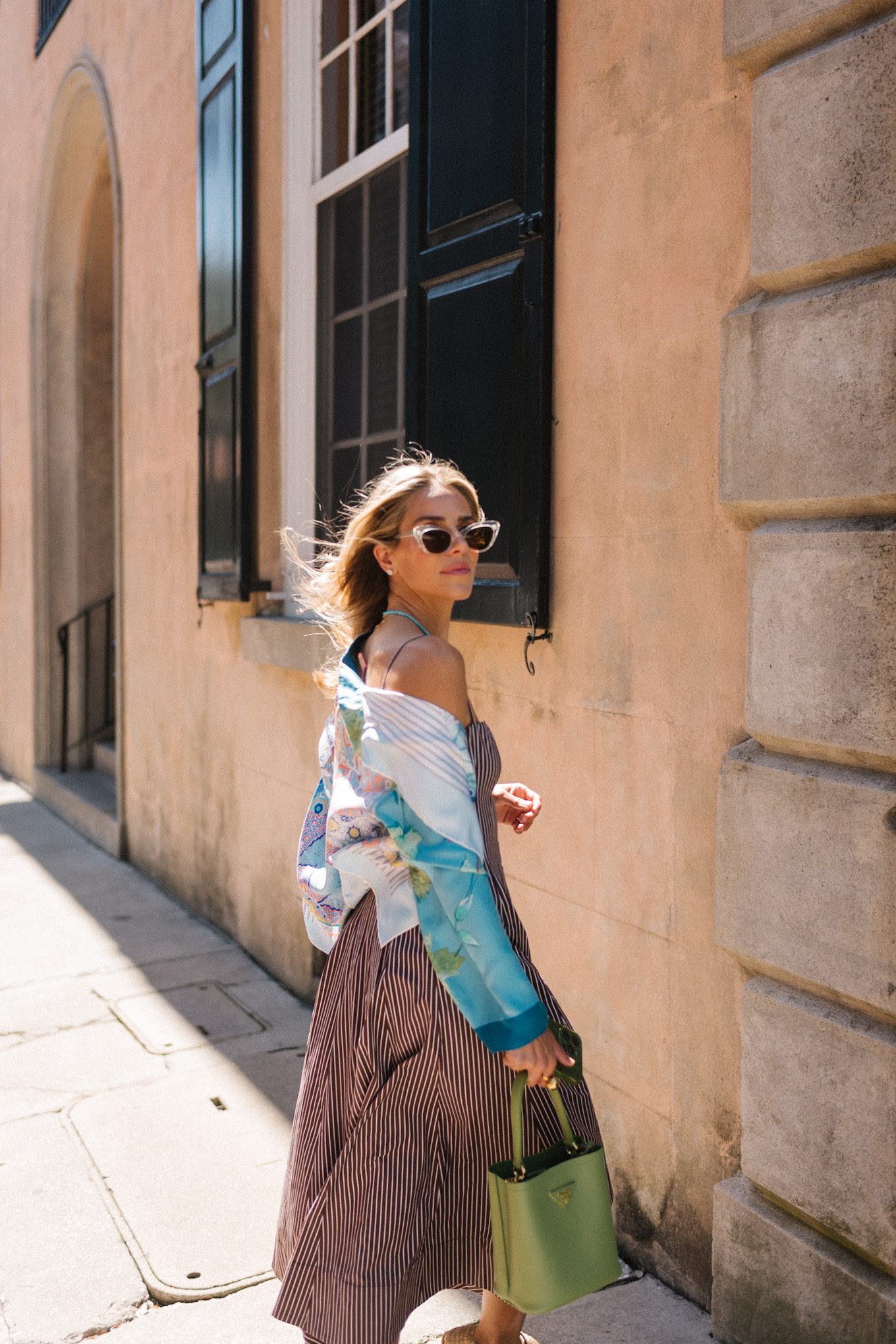 brown striped midi dress blue silk jacket green handbag woven flats