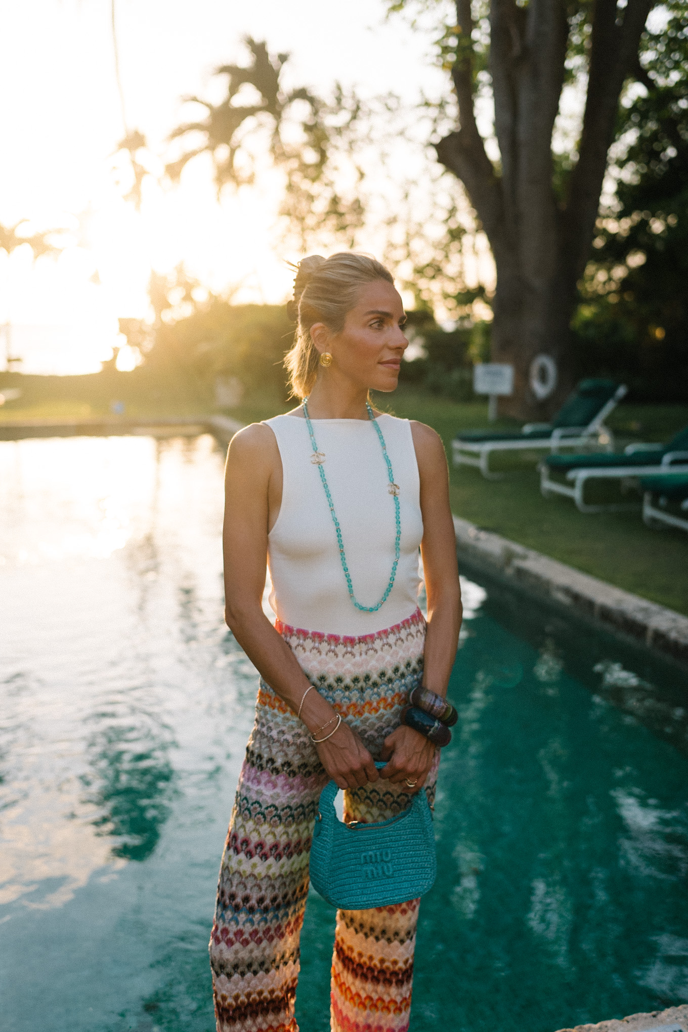 rainbow stripe mesh pants white tank turquoise necklace turquoise bag