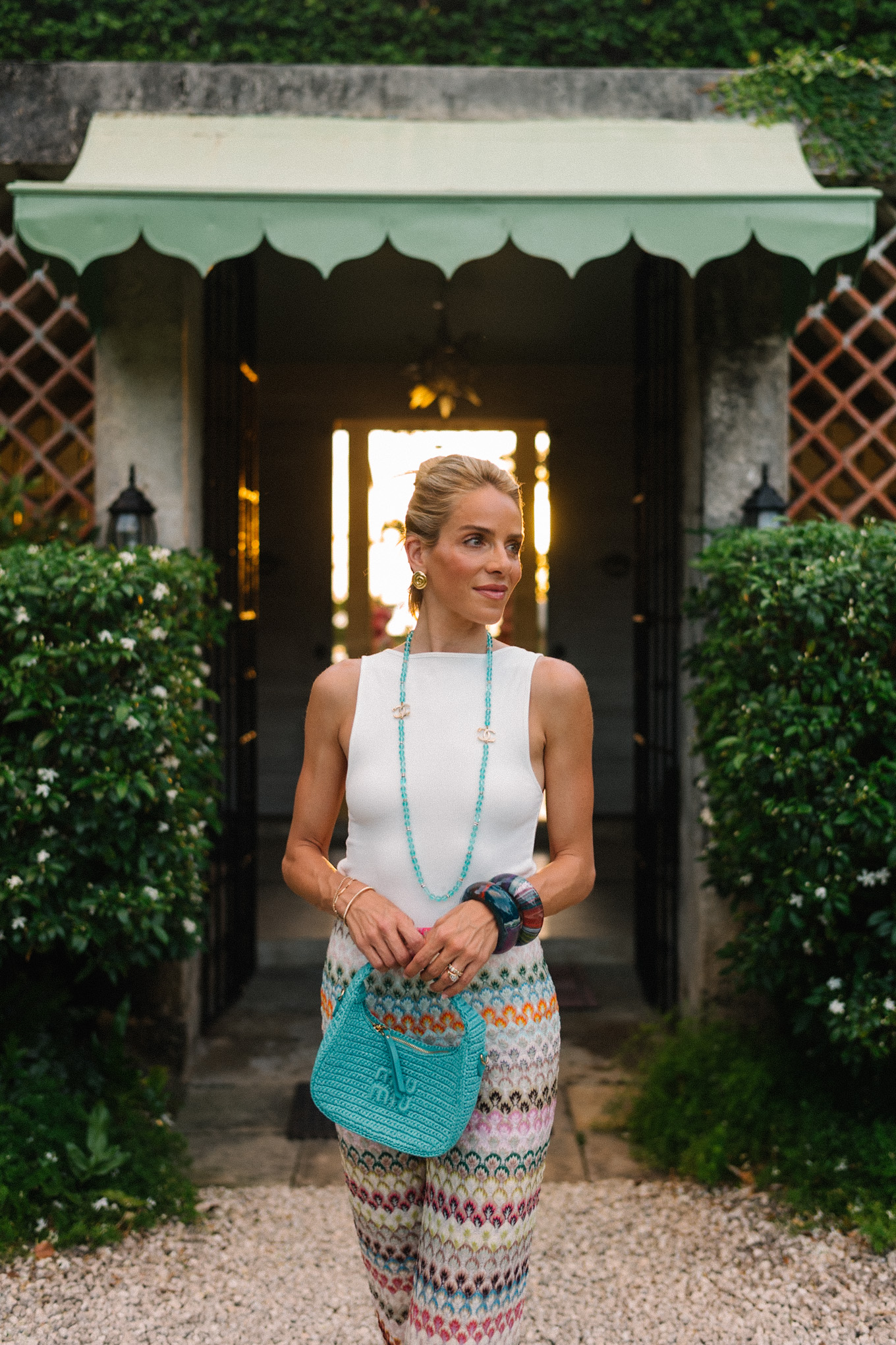 rainbow stripe mesh pants white tank turquoise necklace turquoise bag