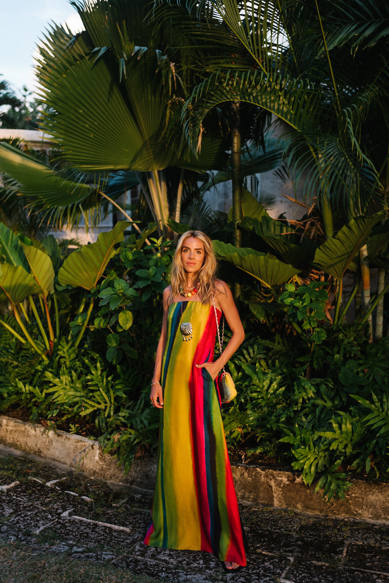 silk rainbow stripe maxi dress rainbow beaded necklace gold seashell necklace rainbow bag