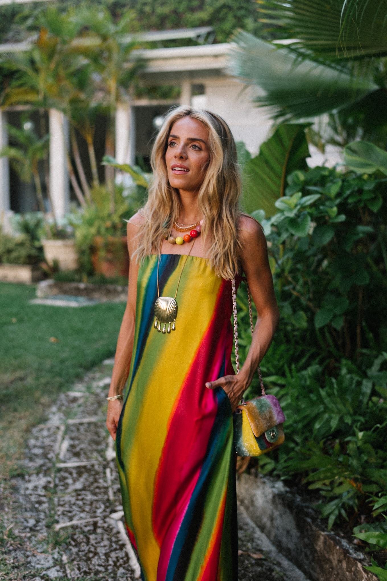 silk rainbow stripe maxi dress rainbow beaded necklace gold seashell necklace rainbow bag