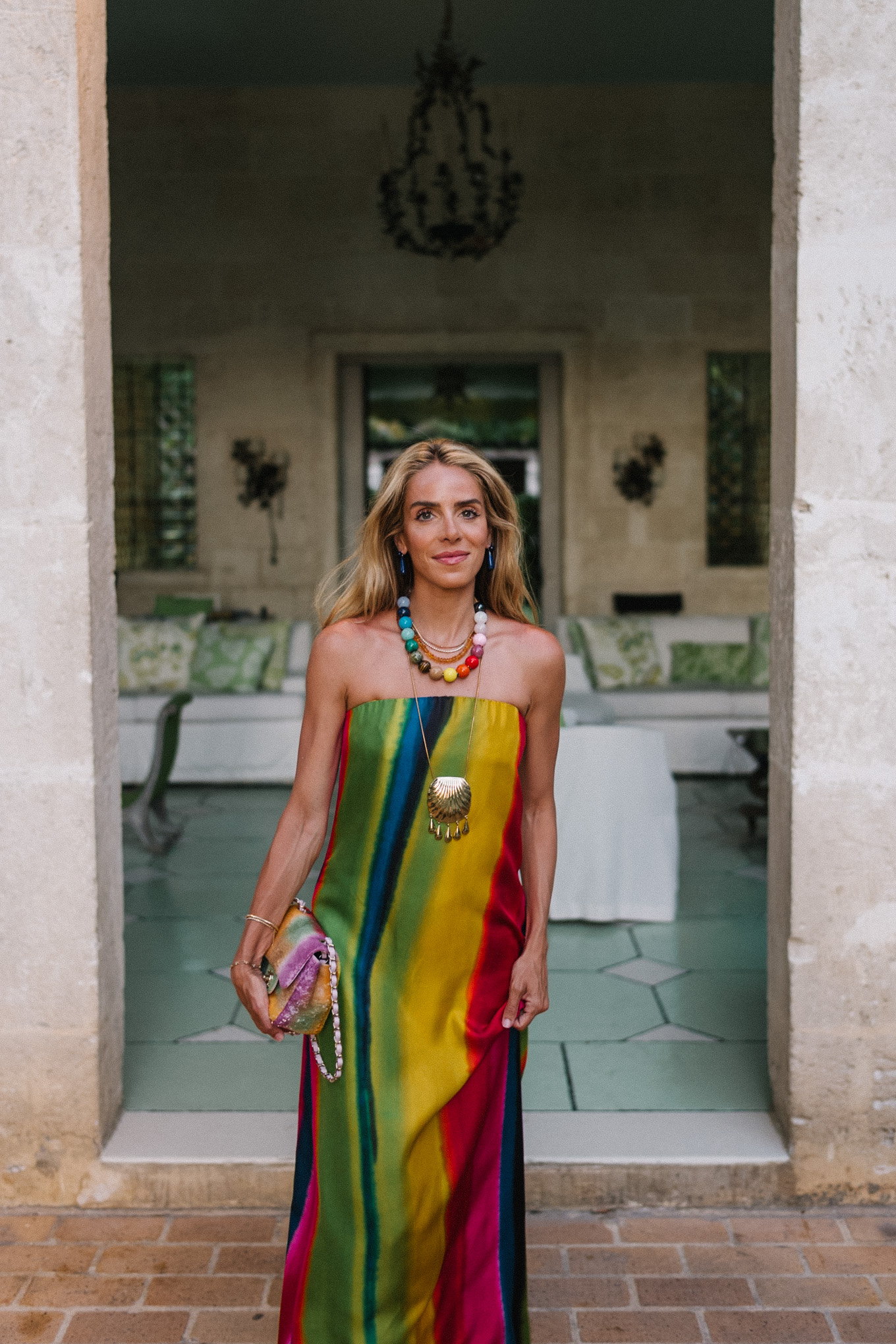 silk rainbow stripe maxi dress rainbow beaded necklace gold seashell necklace rainbow bag