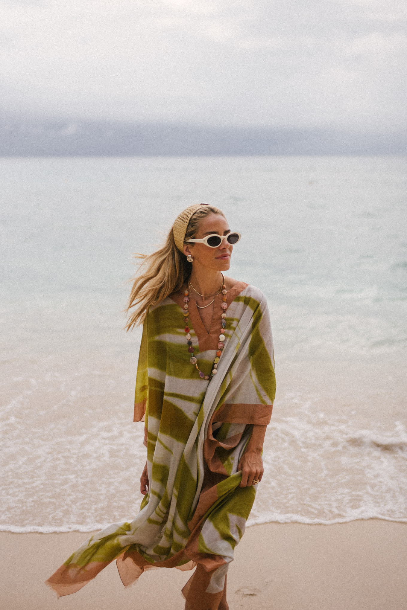 green pink kaftan black pink graphic bikini woven headband white sunglasses