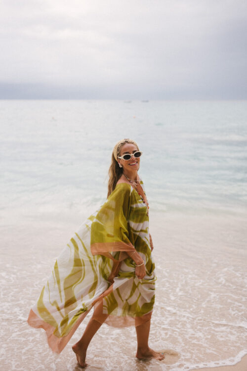 green pink kaftan black pink graphic bikini woven headband white sunglasses