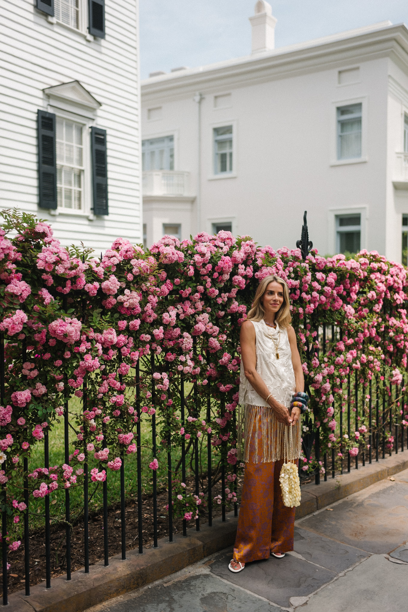 white silk fringe tank burnt orange silk pants sequin bag
