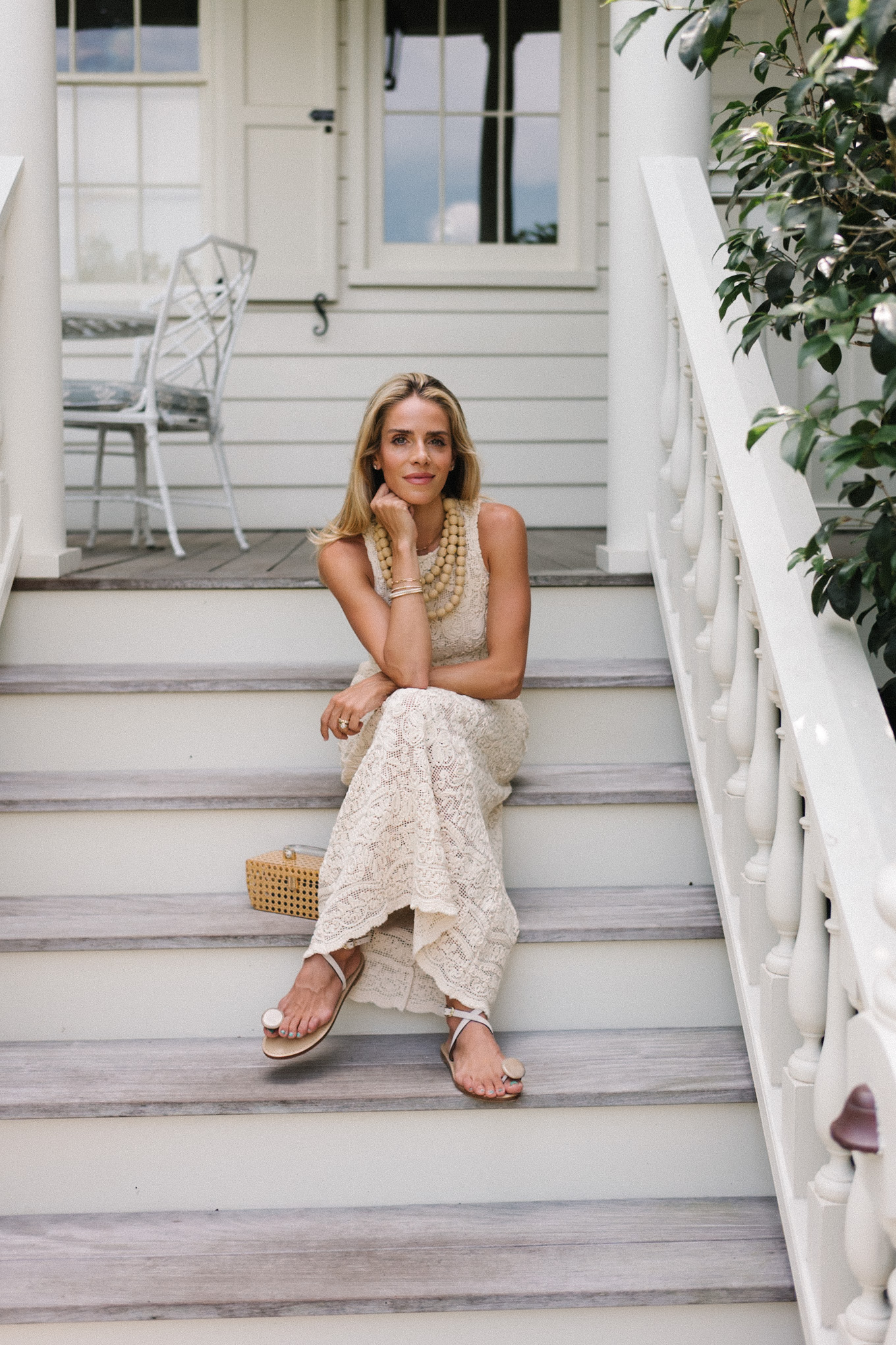 cream lace dress basket clutch rattan beaded necklace strappy sandals