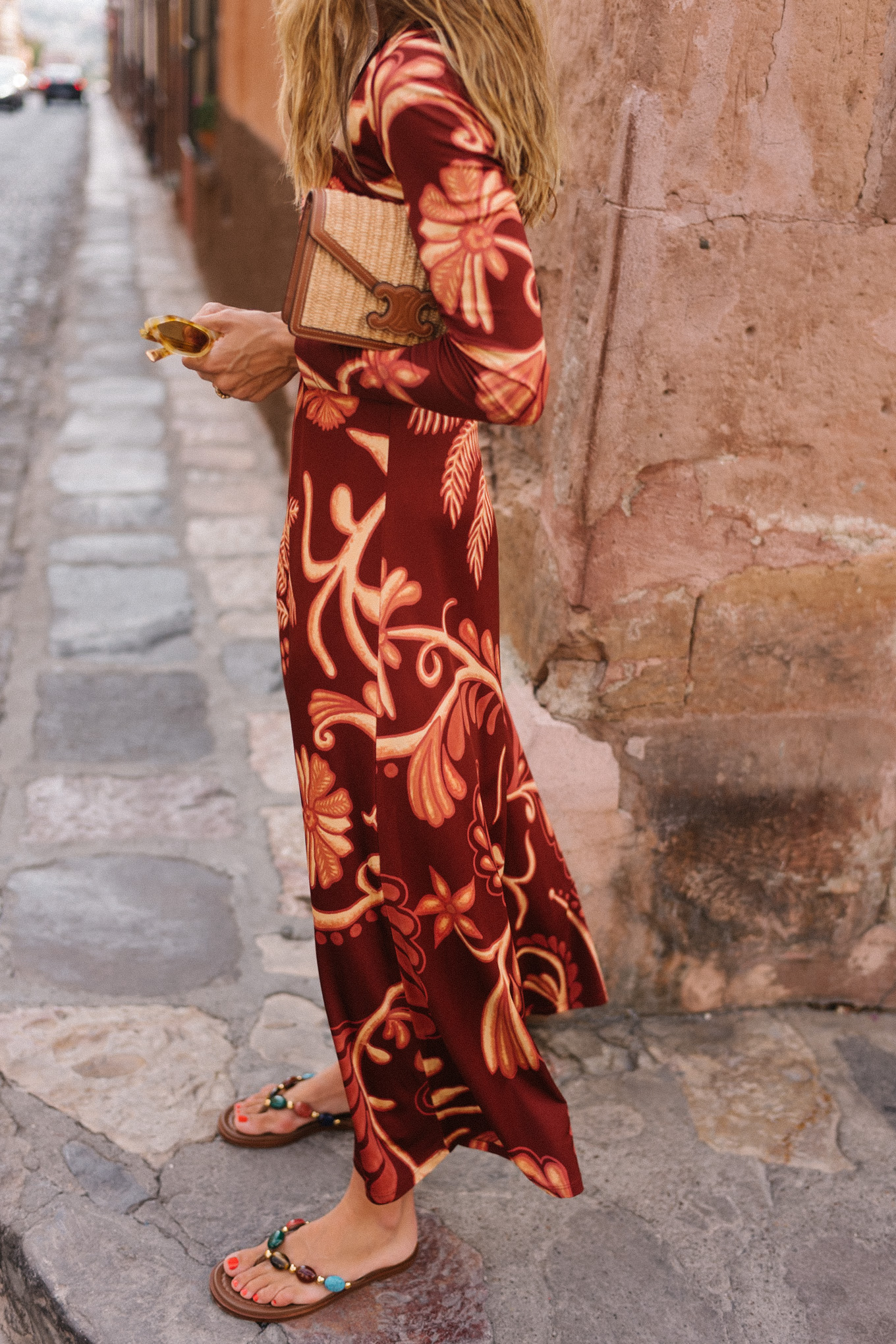 red tropical patterned long sleeved maxi dress